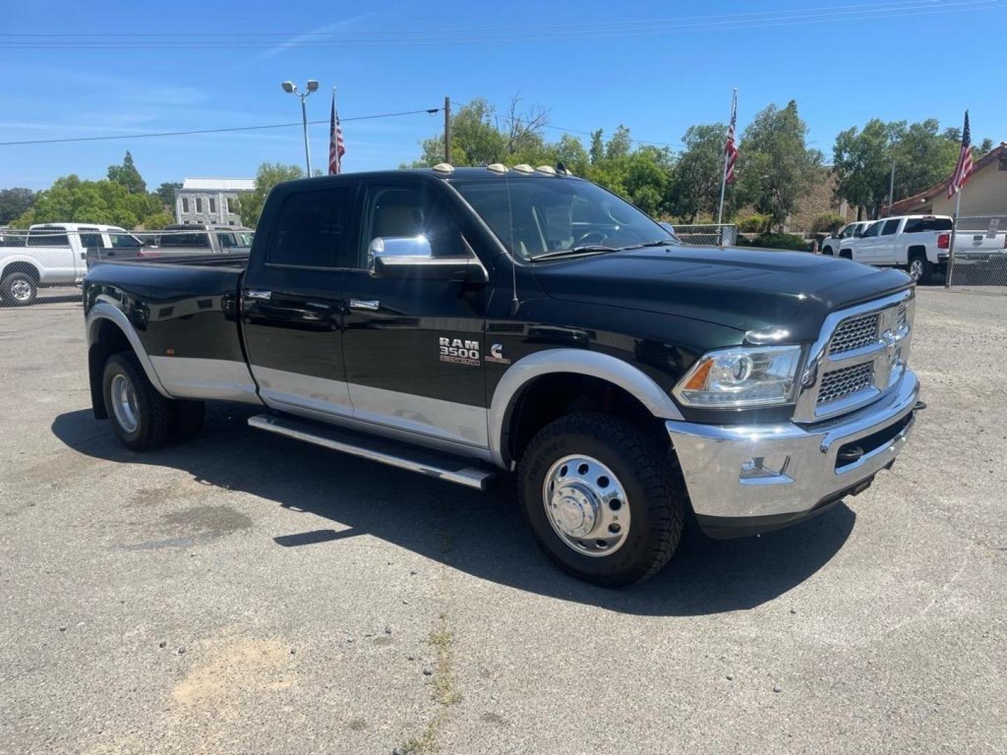 2015 Black Forest Green Pearl Coat/Bright Silver Metall RAM 3500 Laramie (3C63RRJL4FG) with an 6.7L Cummins 6.7L Diesel Turbo I6 350hp 660ft. lbs. Common Rail Direct Injection engine, Automatic transmission, located at 800 Riverside Ave, Roseville, CA, 95678, 916-773-4549 & Toll Free: 866-719-4393, 38.732265, -121.291039 - CUMMINS DIESEL CREW CAB DUALLY 4X4 LARAMIE - Photo#1