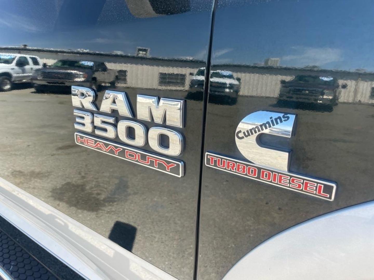2015 Black Forest Green Pearl Coat/Bright Silver Metall RAM 3500 Laramie (3C63RRJL4FG) with an 6.7L Cummins 6.7L Diesel Turbo I6 350hp 660ft. lbs. Common Rail Direct Injection engine, Automatic transmission, located at 800 Riverside Ave, Roseville, CA, 95678, 916-773-4549 & Toll Free: 866-719-4393, 38.732265, -121.291039 - CUMMINS DIESEL CREW CAB DUALLY 4X4 LARAMIE - Photo#2