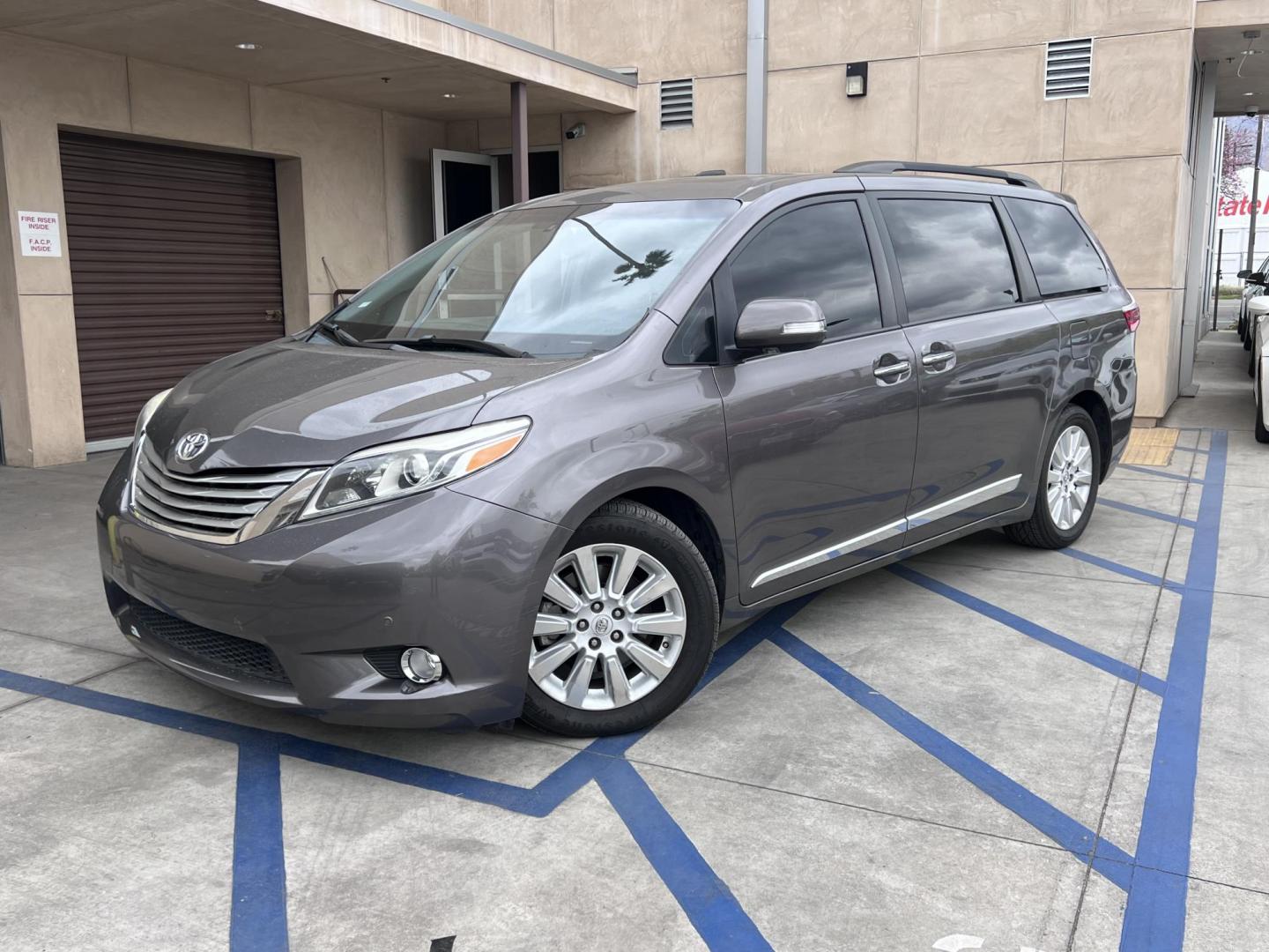 2015 Gray /gray Toyota Sienna XLE FWD 8-Passenger V6 (5TDYK3DC5FS) with an 3.5L V6 EFI DOHC 24V engine, 5-Speed Automatic transmission, located at 30 S. Berkeley Avenue, Pasadena, CA, 91107, (626) 248-7567, 34.145447, -118.109398 - Crown City Motors is a used “Buy Here Pay Here” car dealer in Pasadena CA. “Buy Here Pay Here” financing, means that when you purchase your vehicle from our dealership, that you make the payments to the dealership as well. We do not need the banks approval to get you approved for a used auto - Photo#4