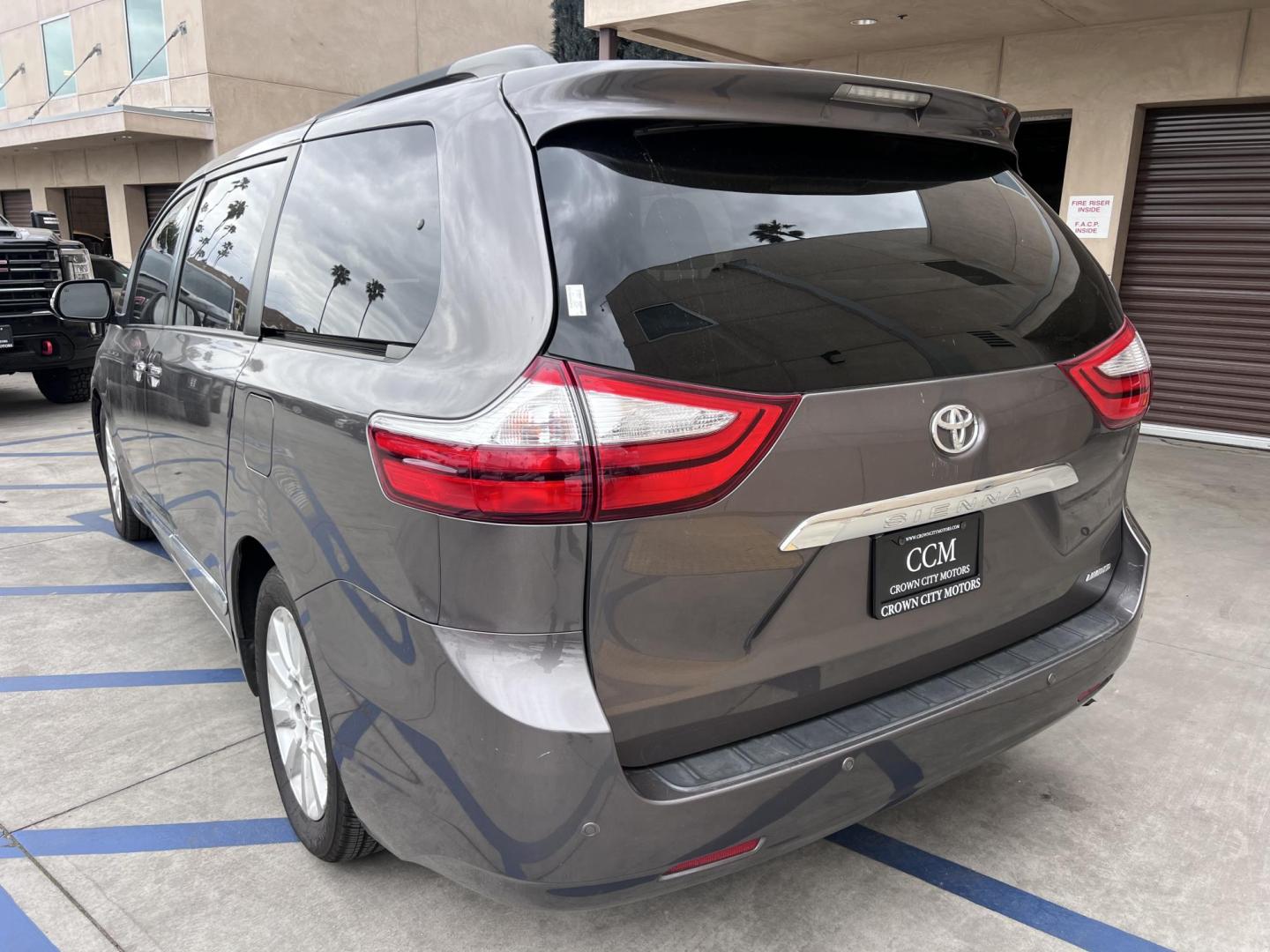 2015 Gray /gray Toyota Sienna XLE FWD 8-Passenger V6 (5TDYK3DC5FS) with an 3.5L V6 EFI DOHC 24V engine, 5-Speed Automatic transmission, located at 30 S. Berkeley Avenue, Pasadena, CA, 91107, (626) 248-7567, 34.145447, -118.109398 - Crown City Motors is a used “Buy Here Pay Here” car dealer in Pasadena CA. “Buy Here Pay Here” financing, means that when you purchase your vehicle from our dealership, that you make the payments to the dealership as well. We do not need the banks approval to get you approved for a used auto - Photo#6