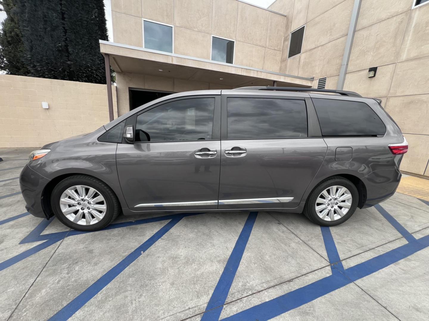 2015 Gray /gray Toyota Sienna XLE FWD 8-Passenger V6 (5TDYK3DC5FS) with an 3.5L V6 EFI DOHC 24V engine, 5-Speed Automatic transmission, located at 30 S. Berkeley Avenue, Pasadena, CA, 91107, (626) 248-7567, 34.145447, -118.109398 - Crown City Motors is a used “Buy Here Pay Here” car dealer in Pasadena CA. “Buy Here Pay Here” financing, means that when you purchase your vehicle from our dealership, that you make the payments to the dealership as well. We do not need the banks approval to get you approved for a used auto - Photo#5