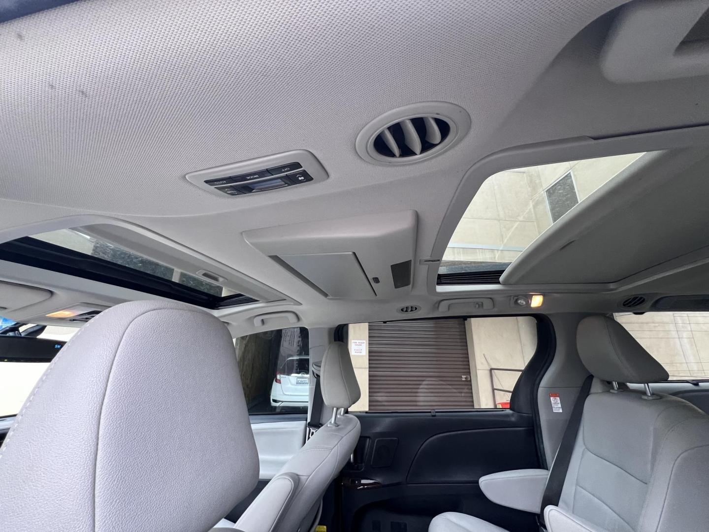 2015 Gray /gray Toyota Sienna XLE FWD 8-Passenger V6 (5TDYK3DC5FS) with an 3.5L V6 EFI DOHC 24V engine, 5-Speed Automatic transmission, located at 30 S. Berkeley Avenue, Pasadena, CA, 91107, (626) 248-7567, 34.145447, -118.109398 - Crown City Motors is a used “Buy Here Pay Here” car dealer in Pasadena CA. “Buy Here Pay Here” financing, means that when you purchase your vehicle from our dealership, that you make the payments to the dealership as well. We do not need the banks approval to get you approved for a used auto - Photo#20