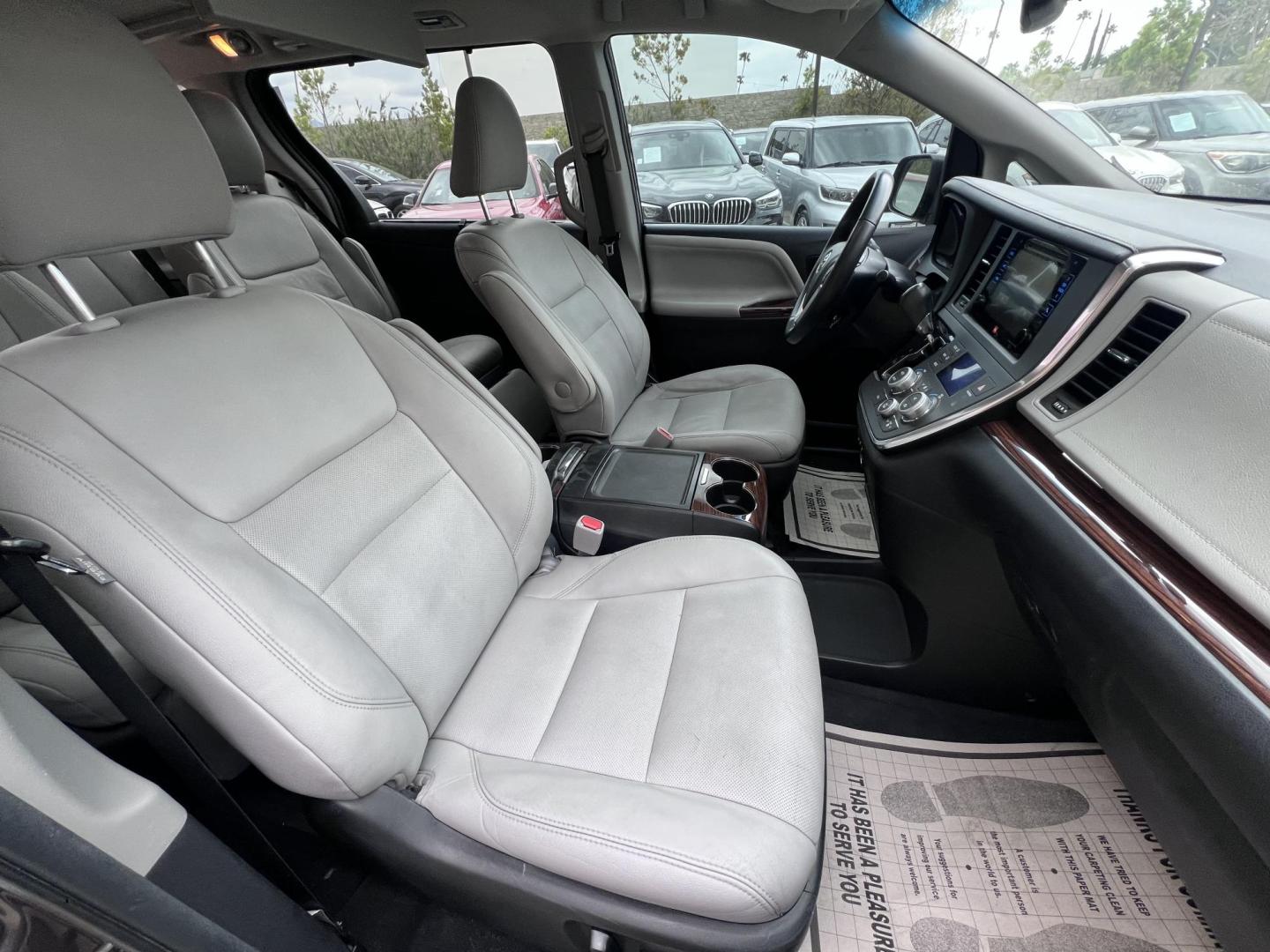 2015 Gray /gray Toyota Sienna XLE FWD 8-Passenger V6 (5TDYK3DC5FS) with an 3.5L V6 EFI DOHC 24V engine, 5-Speed Automatic transmission, located at 30 S. Berkeley Avenue, Pasadena, CA, 91107, (626) 248-7567, 34.145447, -118.109398 - Crown City Motors is a used “Buy Here Pay Here” car dealer in Pasadena CA. “Buy Here Pay Here” financing, means that when you purchase your vehicle from our dealership, that you make the payments to the dealership as well. We do not need the banks approval to get you approved for a used auto - Photo#26