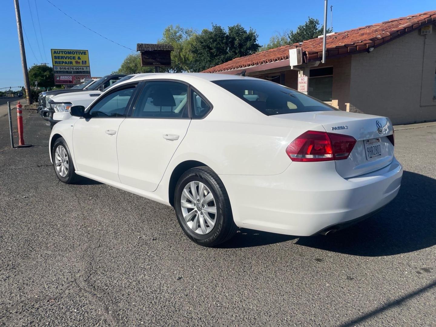 2015 Candy White Volkswagen Passat 1.8T Wolfsburg Edition (1VWAT7A35FC) with an 1.8L 1.8L Turbo I4 170hp 184ft. lbs. Direct Injection engine, 6-Speed Shiftable Automatic transmission, located at 800 Riverside Ave, Roseville, CA, 95678, 916-773-4549 & Toll Free: 866-719-4393, 38.732265, -121.291039 - Photo#2