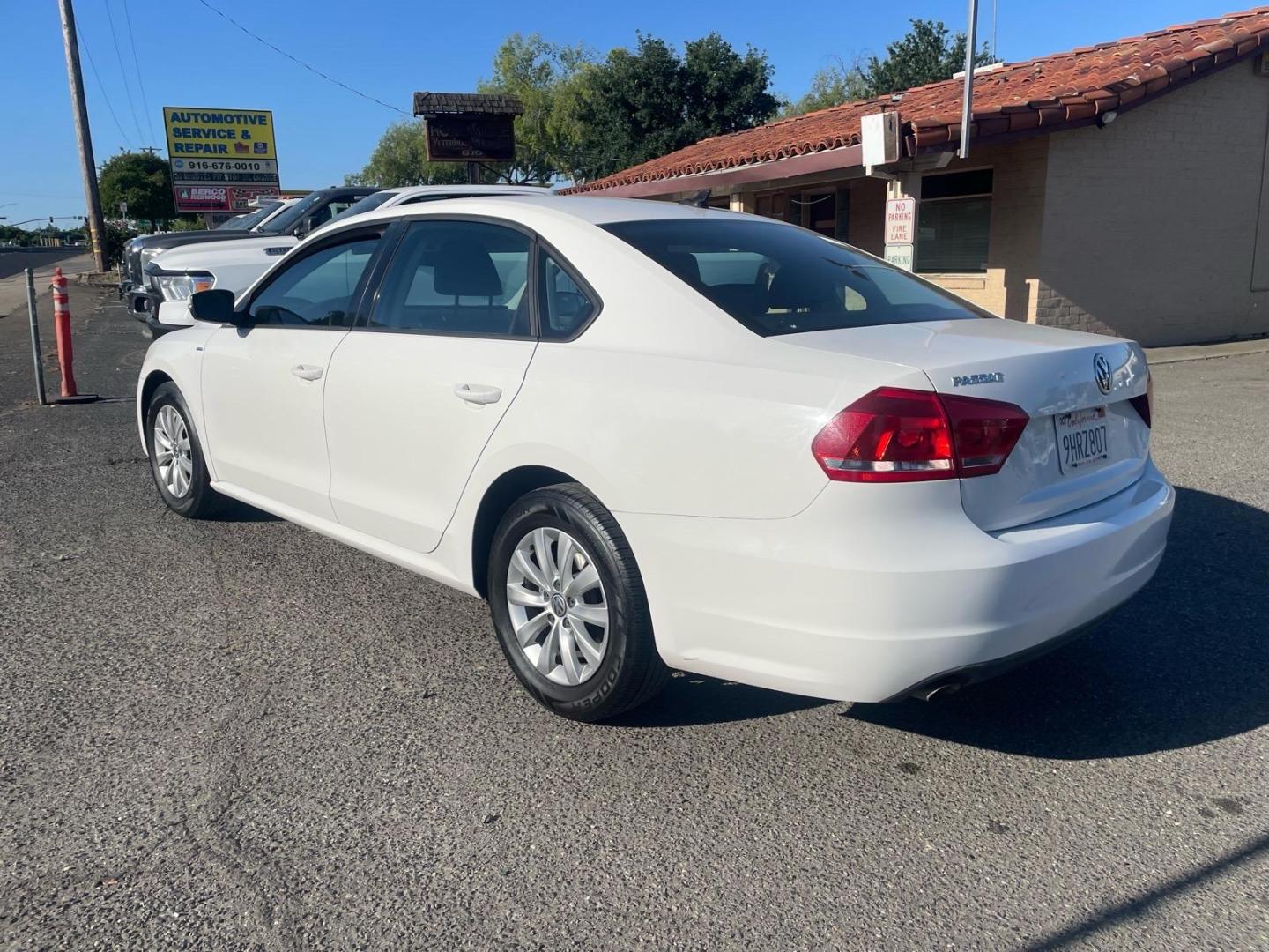2015 Candy White Volkswagen Passat 1.8T Wolfsburg Edition (1VWAT7A35FC) with an 1.8L 1.8L Turbo I4 170hp 184ft. lbs. Direct Injection engine, 6-Speed Shiftable Automatic transmission, located at 800 Riverside Ave, Roseville, CA, 95678, 916-773-4549 & Toll Free: 866-719-4393, 38.732265, -121.291039 - Photo#3