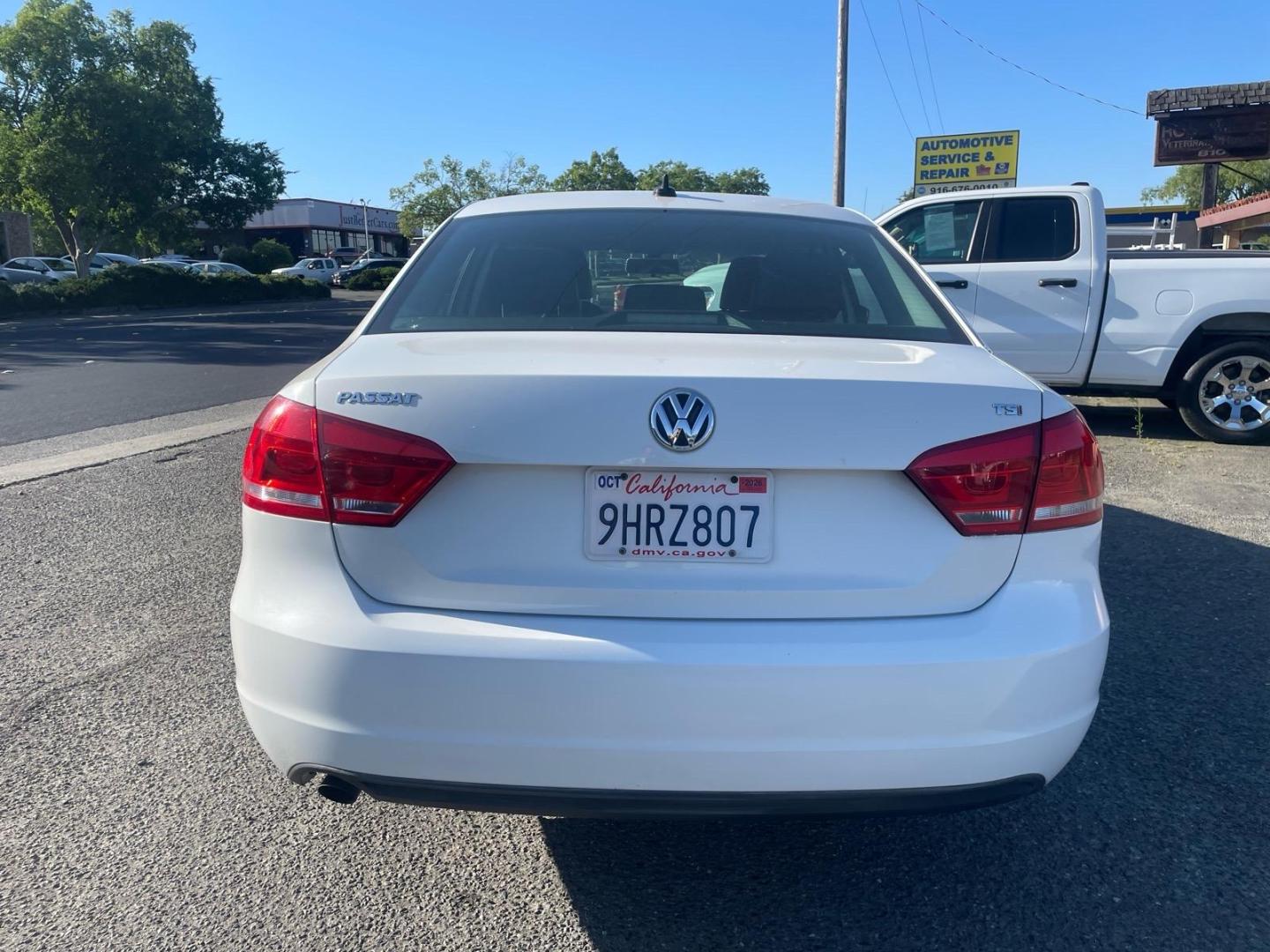 2015 Candy White Volkswagen Passat 1.8T Wolfsburg Edition (1VWAT7A35FC) with an 1.8L 1.8L Turbo I4 170hp 184ft. lbs. Direct Injection engine, 6-Speed Shiftable Automatic transmission, located at 800 Riverside Ave, Roseville, CA, 95678, 916-773-4549 & Toll Free: 866-719-4393, 38.732265, -121.291039 - Photo#4