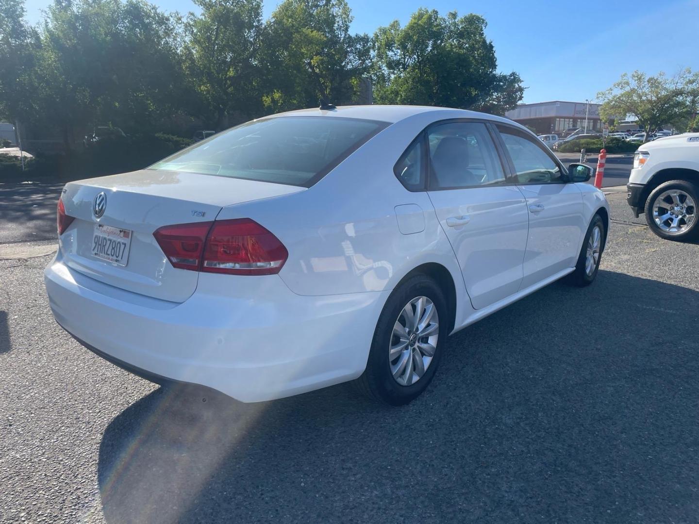 2015 Candy White Volkswagen Passat 1.8T Wolfsburg Edition (1VWAT7A35FC) with an 1.8L 1.8L Turbo I4 170hp 184ft. lbs. Direct Injection engine, 6-Speed Shiftable Automatic transmission, located at 800 Riverside Ave, Roseville, CA, 95678, 916-773-4549 & Toll Free: 866-719-4393, 38.732265, -121.291039 - Photo#5
