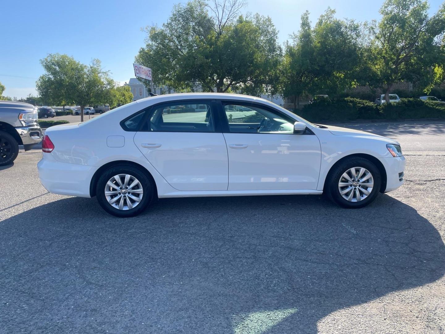 2015 Candy White Volkswagen Passat 1.8T Wolfsburg Edition (1VWAT7A35FC) with an 1.8L 1.8L Turbo I4 170hp 184ft. lbs. Direct Injection engine, 6-Speed Shiftable Automatic transmission, located at 800 Riverside Ave, Roseville, CA, 95678, 916-773-4549 & Toll Free: 866-719-4393, 38.732265, -121.291039 - Photo#7