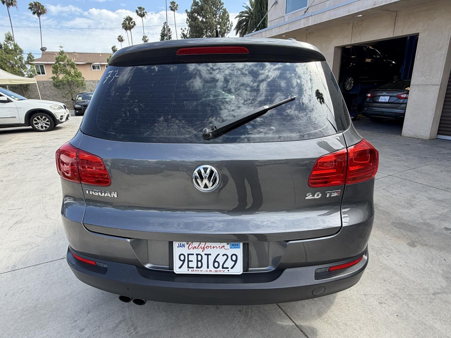 2015 Gray /BLACK Volkswagen Tiguan S (WVGAV7AX8FW) with an 2.0L L4 DOHC 16V TURBO engine, 6-Speed Automatic transmission, located at 30 S. Berkeley Avenue, Pasadena, CA, 91107, (626) 248-7567, 34.145447, -118.109398 - # 2015 Volkswagen Tiguan for Sale in Pasadena, CA – Buy Here Pay Here Financing Available If you're looking for a reliable, fuel-efficient, and versatile SUV, this 2015 Volkswagen Tiguan is an excellent choice. Available now at Crown City Motors in Pasadena, California, this Tiguan combines Ger- Photo#2
