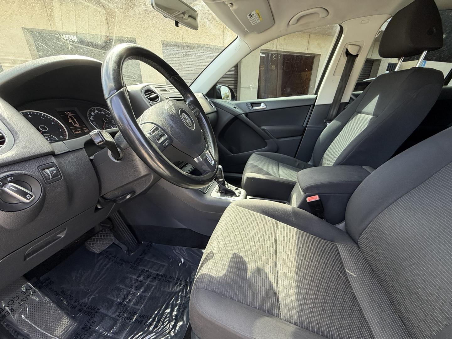 2015 Gray /BLACK Volkswagen Tiguan S (WVGAV7AX8FW) with an 2.0L L4 DOHC 16V TURBO engine, 6-Speed Automatic transmission, located at 30 S. Berkeley Avenue, Pasadena, CA, 91107, (626) 248-7567, 34.145447, -118.109398 - # 2015 Volkswagen Tiguan for Sale in Pasadena, CA – Buy Here Pay Here Financing Available If you're looking for a reliable, fuel-efficient, and versatile SUV, this 2015 Volkswagen Tiguan is an excellent choice. Available now at Crown City Motors in Pasadena, California, this Tiguan combines Ger- Photo#3