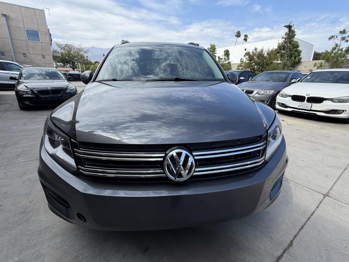 2015 Gray /BLACK Volkswagen Tiguan S (WVGAV7AX8FW) with an 2.0L L4 DOHC 16V TURBO engine, 6-Speed Automatic transmission, located at 30 S. Berkeley Avenue, Pasadena, CA, 91107, (626) 248-7567, 34.145447, -118.109398 - # 2015 Volkswagen Tiguan for Sale in Pasadena, CA – Buy Here Pay Here Financing Available If you're looking for a reliable, fuel-efficient, and versatile SUV, this 2015 Volkswagen Tiguan is an excellent choice. Available now at Crown City Motors in Pasadena, California, this Tiguan combines Ger- Photo#4
