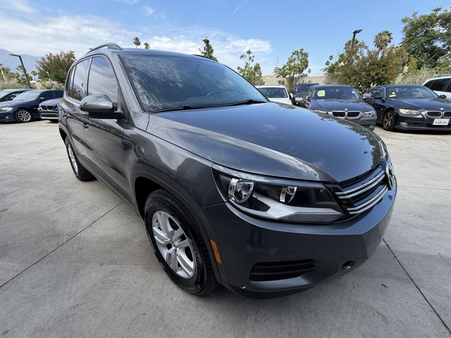 2015 Gray /BLACK Volkswagen Tiguan S (WVGAV7AX8FW) with an 2.0L L4 DOHC 16V TURBO engine, 6-Speed Automatic transmission, located at 30 S. Berkeley Avenue, Pasadena, CA, 91107, (626) 248-7567, 34.145447, -118.109398 - # 2015 Volkswagen Tiguan for Sale in Pasadena, CA – Buy Here Pay Here Financing Available If you're looking for a reliable, fuel-efficient, and versatile SUV, this 2015 Volkswagen Tiguan is an excellent choice. Available now at Crown City Motors in Pasadena, California, this Tiguan combines Ger- Photo#5