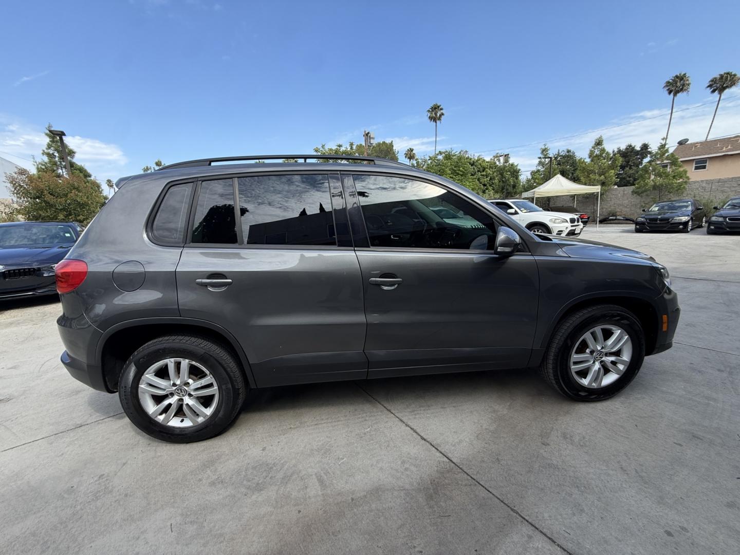 2015 Gray /BLACK Volkswagen Tiguan S (WVGAV7AX8FW) with an 2.0L L4 DOHC 16V TURBO engine, 6-Speed Automatic transmission, located at 30 S. Berkeley Avenue, Pasadena, CA, 91107, (626) 248-7567, 34.145447, -118.109398 - # 2015 Volkswagen Tiguan for Sale in Pasadena, CA – Buy Here Pay Here Financing Available If you're looking for a reliable, fuel-efficient, and versatile SUV, this 2015 Volkswagen Tiguan is an excellent choice. Available now at Crown City Motors in Pasadena, California, this Tiguan combines Ger- Photo#6