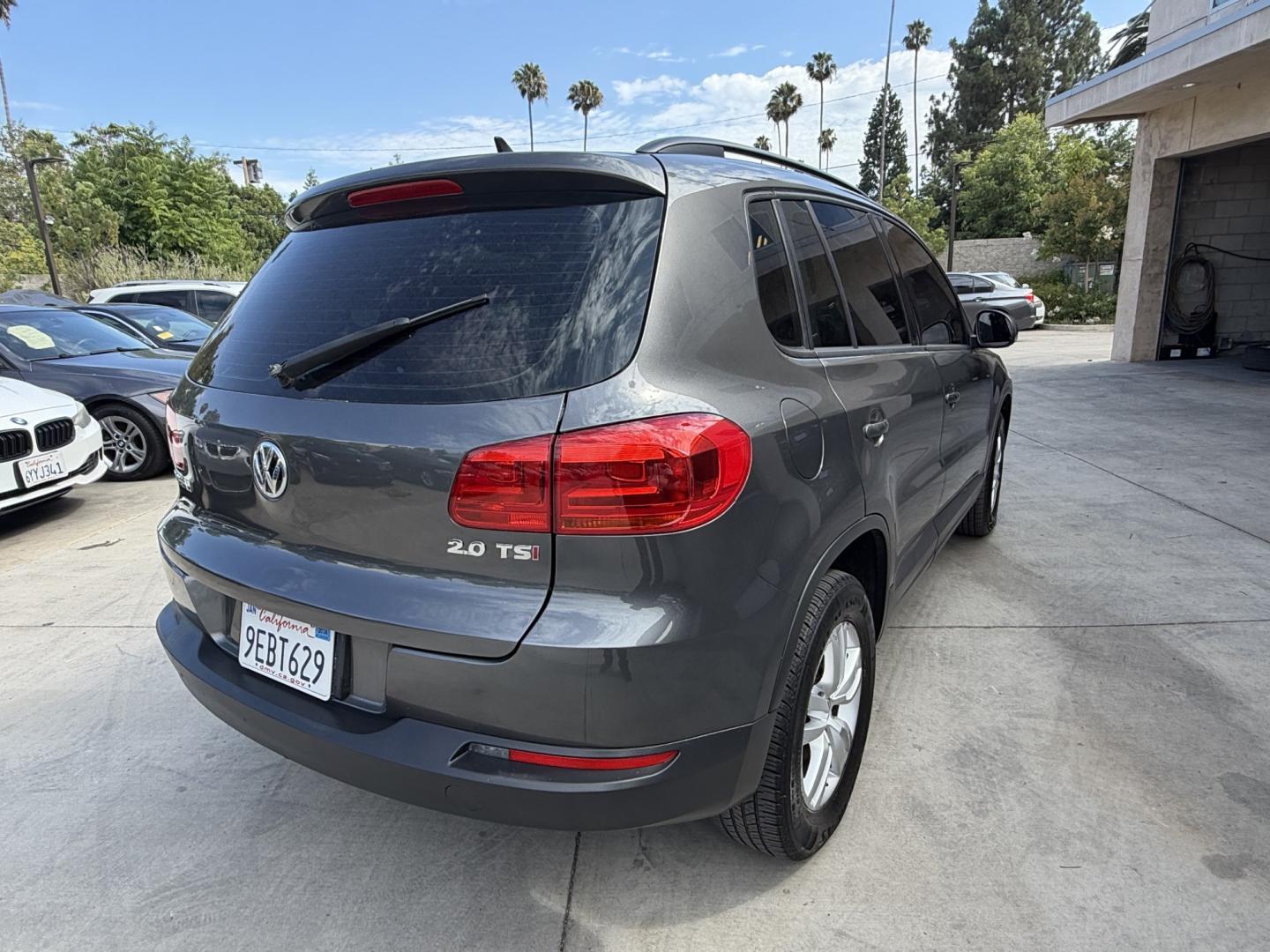 2015 Gray /BLACK Volkswagen Tiguan S (WVGAV7AX8FW) with an 2.0L L4 DOHC 16V TURBO engine, 6-Speed Automatic transmission, located at 30 S. Berkeley Avenue, Pasadena, CA, 91107, (626) 248-7567, 34.145447, -118.109398 - # 2015 Volkswagen Tiguan for Sale in Pasadena, CA – Buy Here Pay Here Financing Available If you're looking for a reliable, fuel-efficient, and versatile SUV, this 2015 Volkswagen Tiguan is an excellent choice. Available now at Crown City Motors in Pasadena, California, this Tiguan combines Ger- Photo#7
