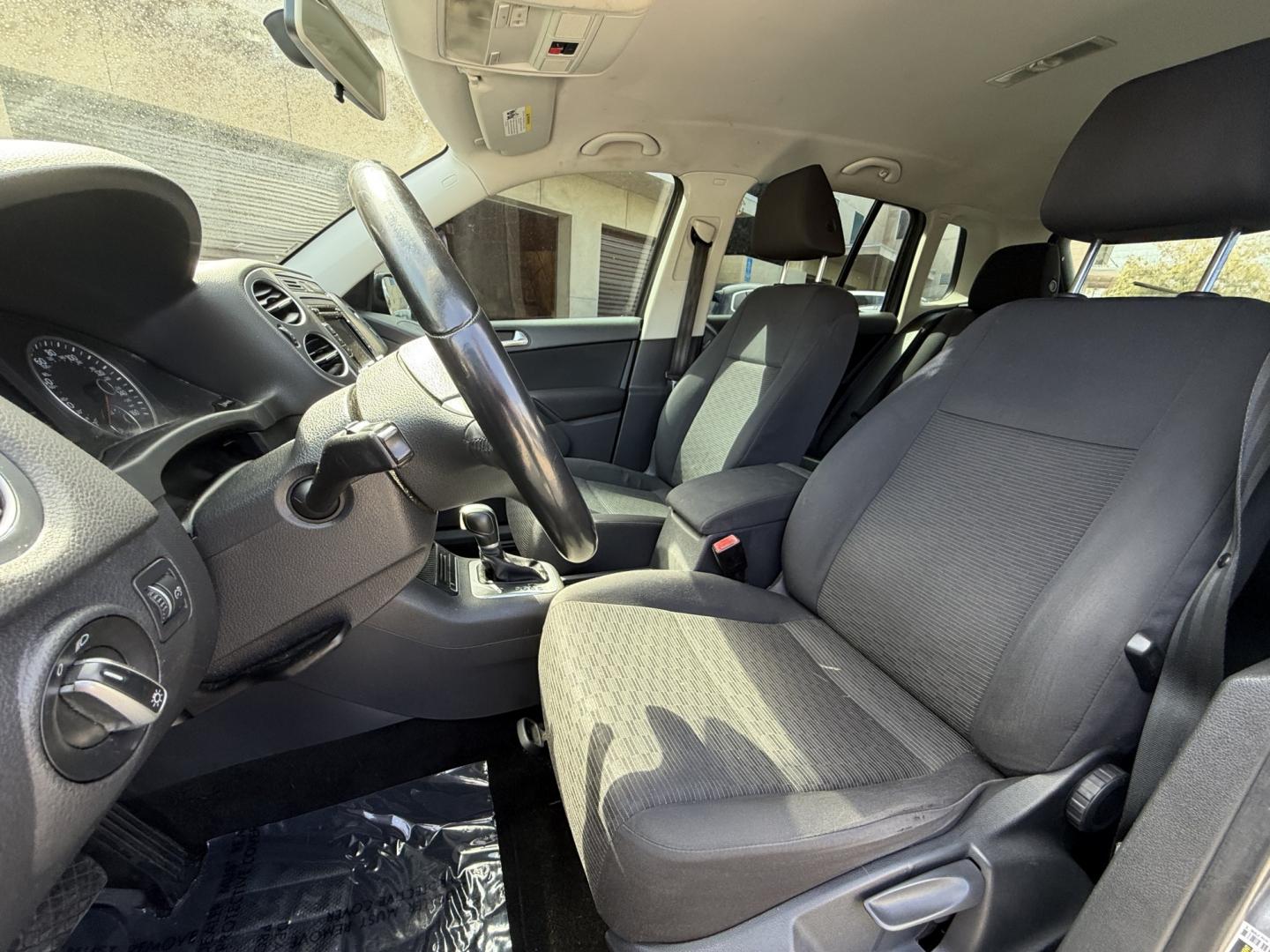 2015 Gray /BLACK Volkswagen Tiguan S (WVGAV7AX8FW) with an 2.0L L4 DOHC 16V TURBO engine, 6-Speed Automatic transmission, located at 30 S. Berkeley Avenue, Pasadena, CA, 91107, (626) 248-7567, 34.145447, -118.109398 - # 2015 Volkswagen Tiguan for Sale in Pasadena, CA – Buy Here Pay Here Financing Available If you're looking for a reliable, fuel-efficient, and versatile SUV, this 2015 Volkswagen Tiguan is an excellent choice. Available now at Crown City Motors in Pasadena, California, this Tiguan combines Ger- Photo#8