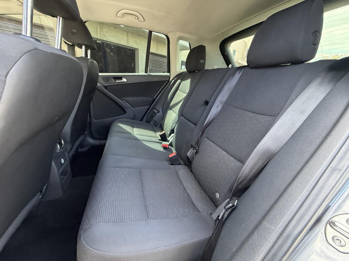 2015 Gray /BLACK Volkswagen Tiguan S (WVGAV7AX8FW) with an 2.0L L4 DOHC 16V TURBO engine, 6-Speed Automatic transmission, located at 30 S. Berkeley Avenue, Pasadena, CA, 91107, (626) 248-7567, 34.145447, -118.109398 - # 2015 Volkswagen Tiguan for Sale in Pasadena, CA – Buy Here Pay Here Financing Available If you're looking for a reliable, fuel-efficient, and versatile SUV, this 2015 Volkswagen Tiguan is an excellent choice. Available now at Crown City Motors in Pasadena, California, this Tiguan combines Ger- Photo#9