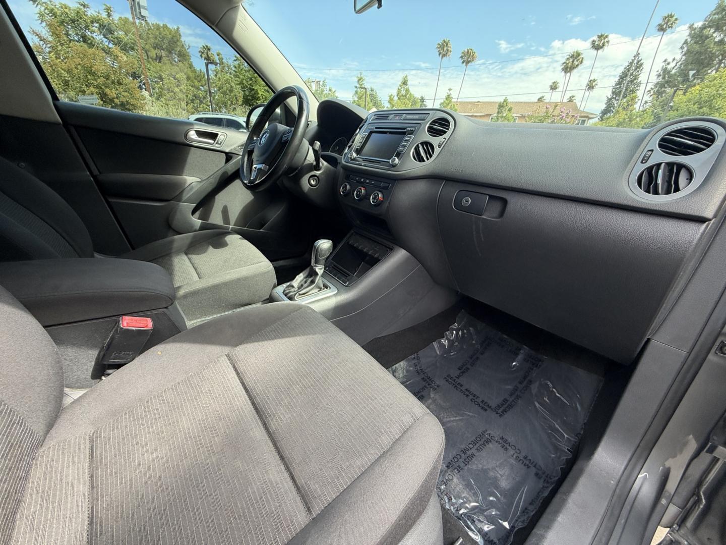 2015 Gray /BLACK Volkswagen Tiguan S (WVGAV7AX8FW) with an 2.0L L4 DOHC 16V TURBO engine, 6-Speed Automatic transmission, located at 30 S. Berkeley Avenue, Pasadena, CA, 91107, (626) 248-7567, 34.145447, -118.109398 - # 2015 Volkswagen Tiguan for Sale in Pasadena, CA – Buy Here Pay Here Financing Available If you're looking for a reliable, fuel-efficient, and versatile SUV, this 2015 Volkswagen Tiguan is an excellent choice. Available now at Crown City Motors in Pasadena, California, this Tiguan combines Ger- Photo#12