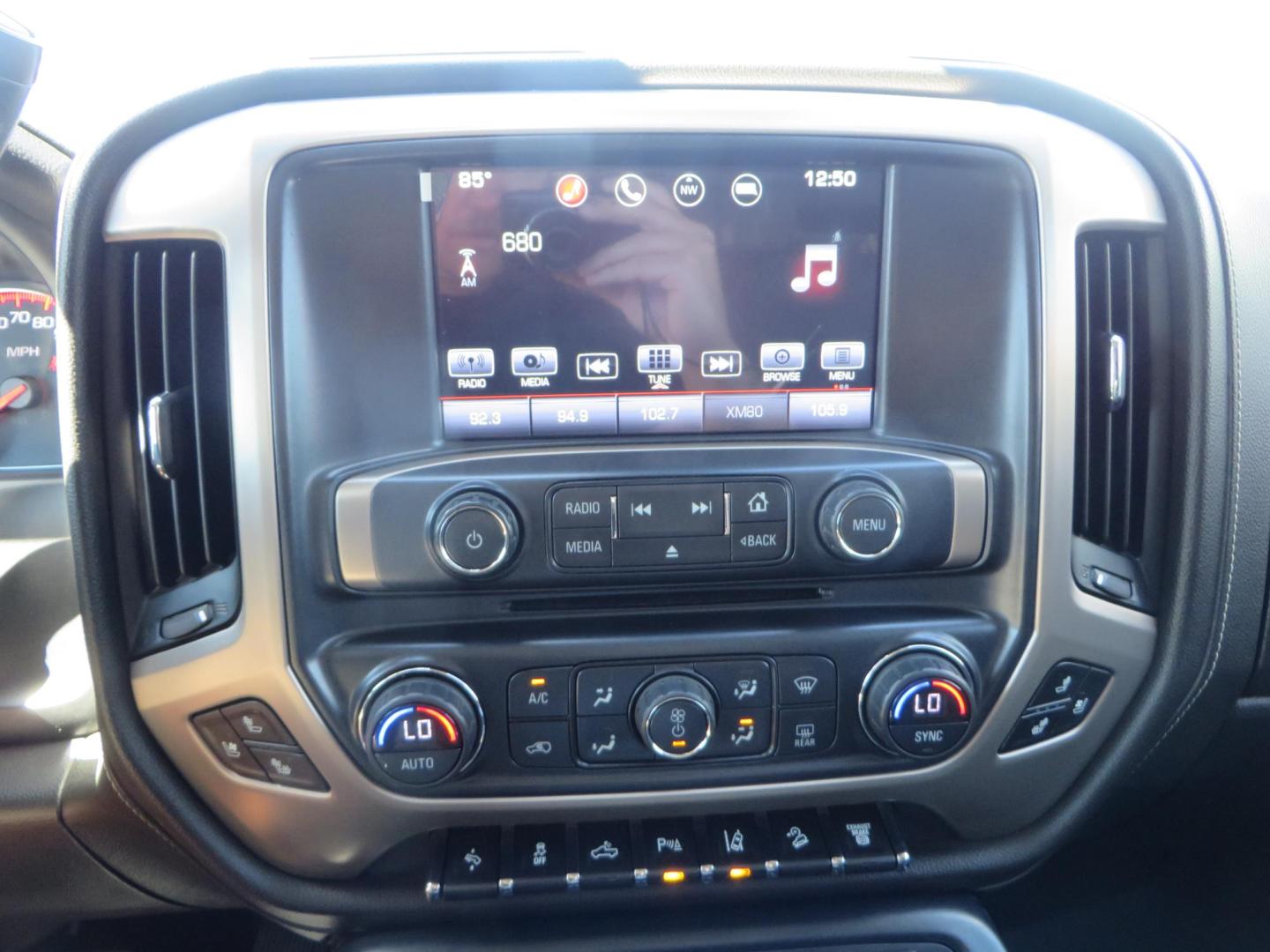 2016 GMC Sierra 2500HD Denali Crew Cab 4WD (1GT12UE8XGF) with an 6.6L V8 OHV 16 DIESEL engine, 6A transmission, located at 2630 Grass Valley Highway, Auburn, CA, 95603, (530) 508-5100, 38.937893, -121.095482 - Lifted Denali 2500 featuring a Pro Comp 6" lift kit, 20" Fuel Nutz wheels, 35" Nitto Ridge Grappler tires, Amp power steps, and Weathertech floor liners. - Photo#30