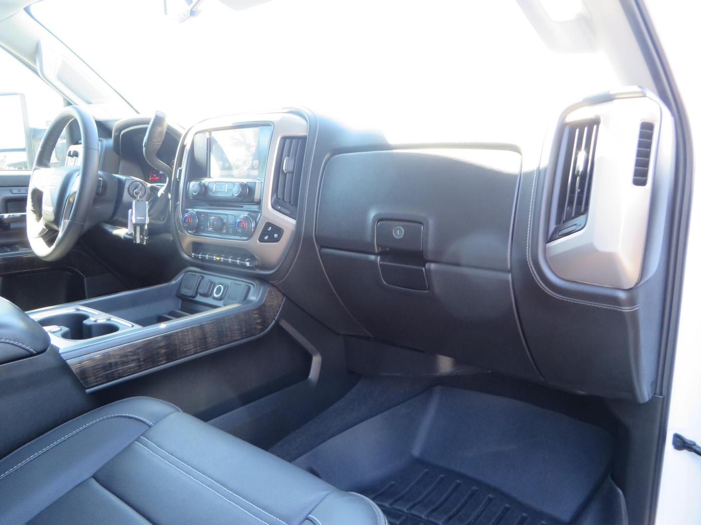 2016 GMC Sierra 2500HD Denali Crew Cab 4WD (1GT12UE8XGF) with an 6.6L V8 OHV 16 DIESEL engine, 6A transmission, located at 2630 Grass Valley Highway, Auburn, CA, 95603, (530) 508-5100, 38.937893, -121.095482 - Lifted Denali 2500 featuring a Pro Comp 6" lift kit, 20" Fuel Nutz wheels, 35" Nitto Ridge Grappler tires, Amp power steps, and Weathertech floor liners. - Photo#64