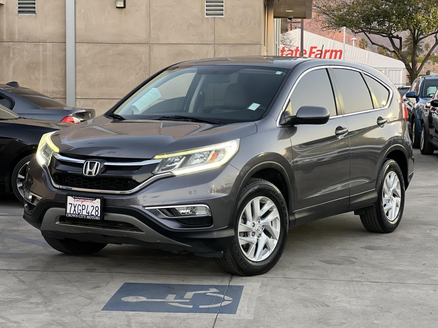 2016 Urban Titanium Metallic: /Gray Honda CR-V EX 2WD (3CZRM3H50GG) with an 2.4L L4 DOHC 16V engine, CVT transmission, located at 30 S. Berkeley Avenue, Pasadena, CA, 91107, (626) 248-7567, 34.145447, -118.109398 - 2016 Honda CR-V EX-L – Reliable, Stylish, and Affordable with Flexible Financing The 2016 Honda CR-V EX-L is the perfect blend of reliability, practicality, and comfort, making it an excellent choice for families, commuters, and adventurers alike. With its sleek design, fuel-efficient performan - Photo#0