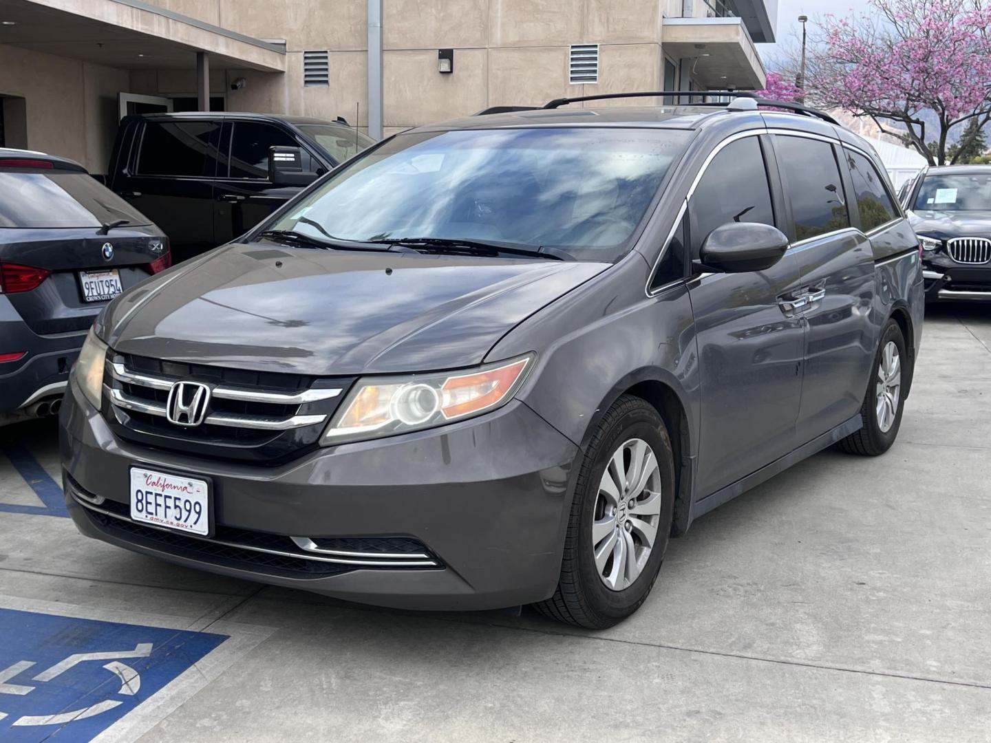 2016 Gray /Gray Honda Odyssey SE (5FNRL5H38GB) with an 3.5L V6 SOHC 24V engine, 6A transmission, located at 30 S. Berkeley Avenue, Pasadena, CA, 91107, (626) 248-7567, 34.145447, -118.109398 - For sale at Crown City Motors, 30 S Berkeley Ave, Pasadena, CA 91107: a reliable 2016 Honda Odyssey with rear AC, perfect for families needing a spacious 7-passenger minivan. This well-maintained vehicle offers a smooth ride, ample cargo space, and modern features to ensure comfort on every journey. - Photo#0