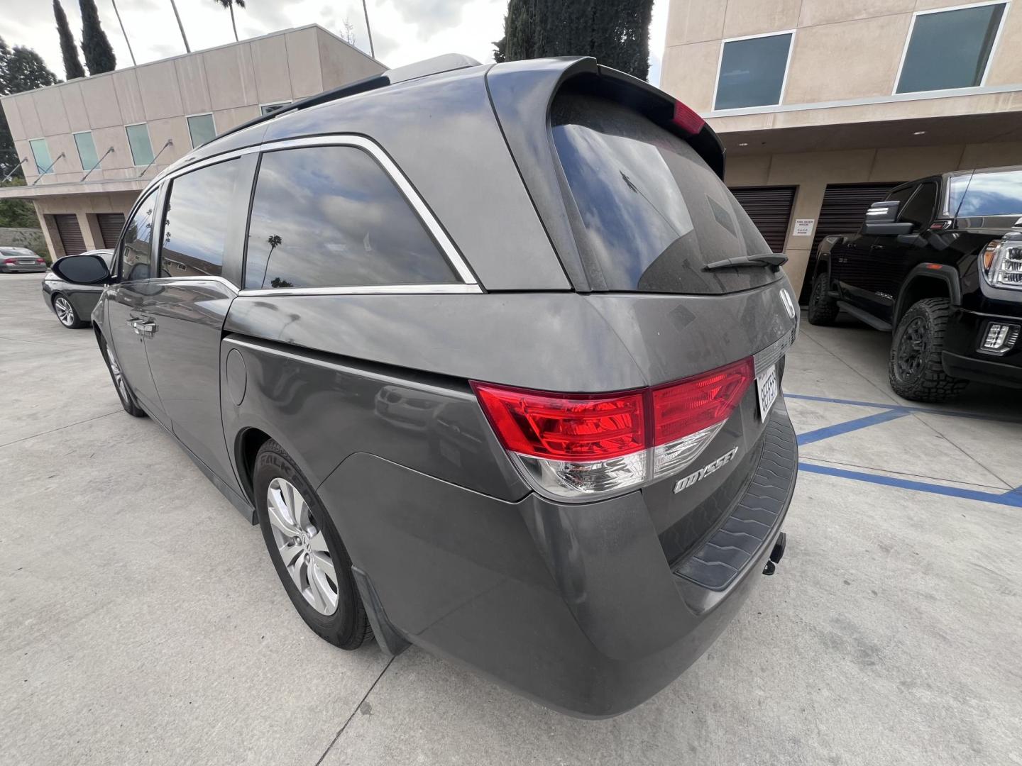 2016 Gray /Gray Honda Odyssey SE (5FNRL5H38GB) with an 3.5L V6 SOHC 24V engine, 6A transmission, located at 30 S. Berkeley Avenue, Pasadena, CA, 91107, (626) 248-7567, 34.145447, -118.109398 - For sale at Crown City Motors, 30 S Berkeley Ave, Pasadena, CA 91107: a reliable 2016 Honda Odyssey with rear AC, perfect for families needing a spacious 7-passenger minivan. This well-maintained vehicle offers a smooth ride, ample cargo space, and modern features to ensure comfort on every journey. - Photo#1
