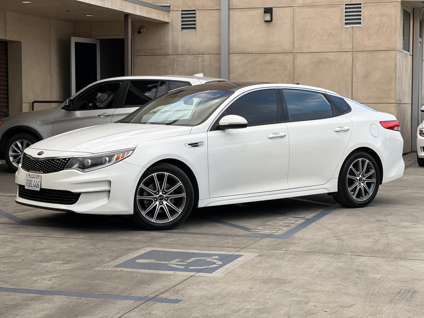 2016 White /Black Kia Optima EX (5XXGU4L3XGG) with an 2.4L L4 DOHC 16V engine, 6A transmission, located at 30 S. Berkeley Avenue, Pasadena, CA, 91107, (626) 248-7567, 34.145447, -118.109398 - Photo#0