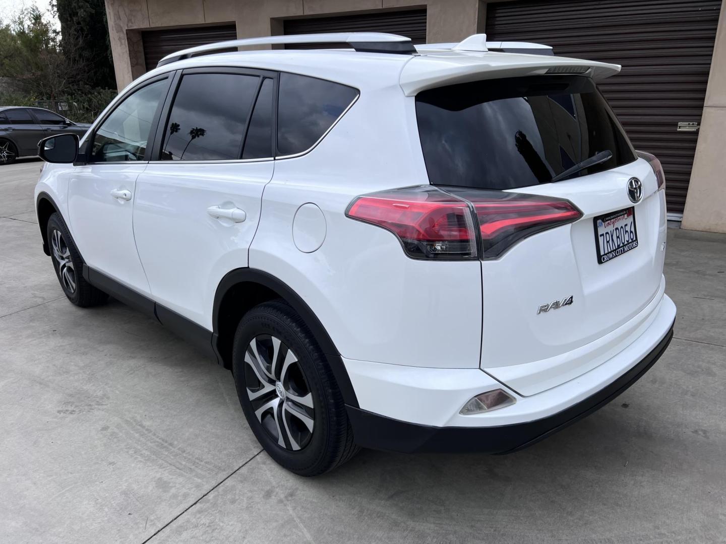 2016 White /Black Toyota RAV4 LE FWD (2T3ZFREV2GW) with an 2.5L L4 DOHC 16V engine, 6A transmission, located at 30 S. Berkeley Avenue, Pasadena, CA, 91107, (626) 248-7567, 34.145447, -118.109398 - 2016 Toyota RAV4 LE FWD – Reliable Compact SUV at Crown City Motors Are you searching for a dependable, stylish, and affordable compact SUV? Look no further than the 2016 Toyota RAV4 LE FWD, available now at Crown City Motors, located at 30 S Berkeley Ave, Pasadena, CA 91107. This popular crossov - Photo#7