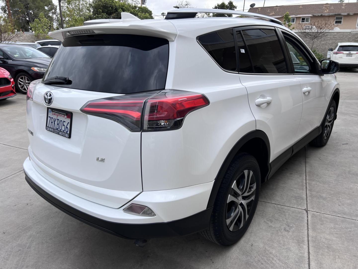 2016 White /Black Toyota RAV4 LE FWD (2T3ZFREV2GW) with an 2.5L L4 DOHC 16V engine, 6A transmission, located at 30 S. Berkeley Avenue, Pasadena, CA, 91107, (626) 248-7567, 34.145447, -118.109398 - 2016 Toyota RAV4 LE FWD – Reliable Compact SUV at Crown City Motors Are you searching for a dependable, stylish, and affordable compact SUV? Look no further than the 2016 Toyota RAV4 LE FWD, available now at Crown City Motors, located at 30 S Berkeley Ave, Pasadena, CA 91107. This popular crossov - Photo#8