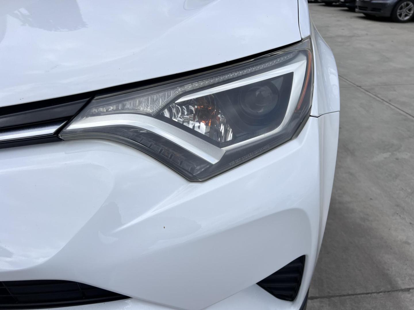2016 White /Black Toyota RAV4 LE FWD (2T3ZFREV2GW) with an 2.5L L4 DOHC 16V engine, 6A transmission, located at 30 S. Berkeley Avenue, Pasadena, CA, 91107, (626) 248-7567, 34.145447, -118.109398 - 2016 Toyota RAV4 LE FWD – Reliable Compact SUV at Crown City Motors Are you searching for a dependable, stylish, and affordable compact SUV? Look no further than the 2016 Toyota RAV4 LE FWD, available now at Crown City Motors, located at 30 S Berkeley Ave, Pasadena, CA 91107. This popular crossov - Photo#9