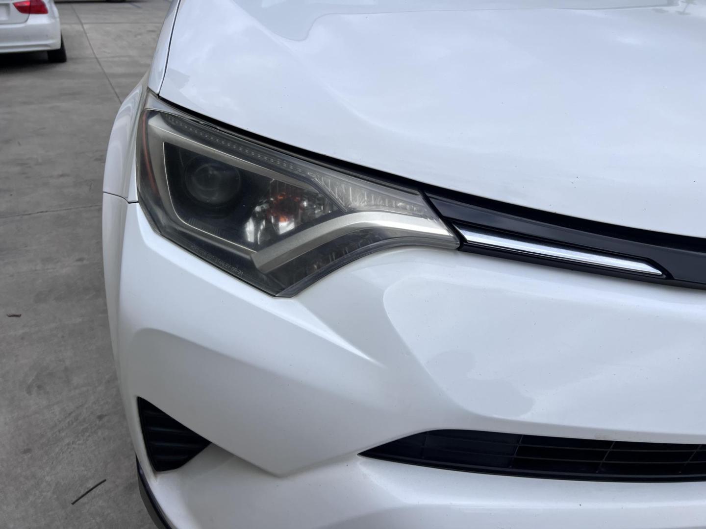 2016 White /Black Toyota RAV4 LE FWD (2T3ZFREV2GW) with an 2.5L L4 DOHC 16V engine, 6A transmission, located at 30 S. Berkeley Avenue, Pasadena, CA, 91107, (626) 248-7567, 34.145447, -118.109398 - 2016 Toyota RAV4 LE FWD – Reliable Compact SUV at Crown City Motors Are you searching for a dependable, stylish, and affordable compact SUV? Look no further than the 2016 Toyota RAV4 LE FWD, available now at Crown City Motors, located at 30 S Berkeley Ave, Pasadena, CA 91107. This popular crossov - Photo#10