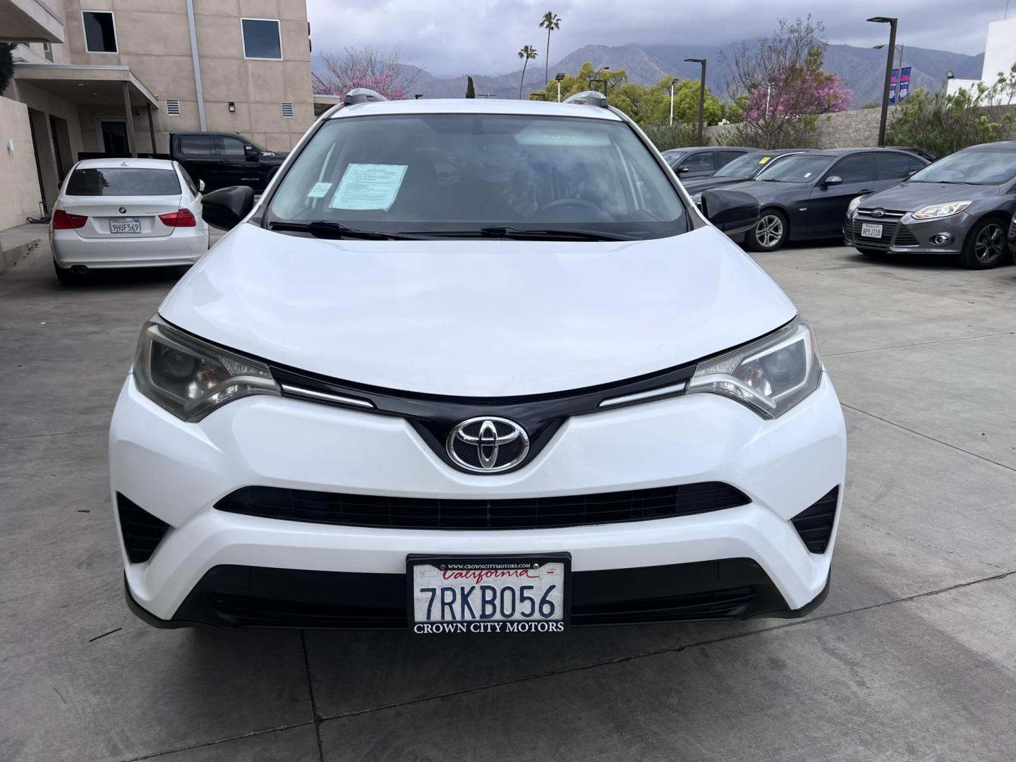 2016 White /Black Toyota RAV4 LE FWD (2T3ZFREV2GW) with an 2.5L L4 DOHC 16V engine, 6A transmission, located at 30 S. Berkeley Avenue, Pasadena, CA, 91107, (626) 248-7567, 34.145447, -118.109398 - 2016 Toyota RAV4 LE FWD – Reliable Compact SUV at Crown City Motors Are you searching for a dependable, stylish, and affordable compact SUV? Look no further than the 2016 Toyota RAV4 LE FWD, available now at Crown City Motors, located at 30 S Berkeley Ave, Pasadena, CA 91107. This popular crossov - Photo#11