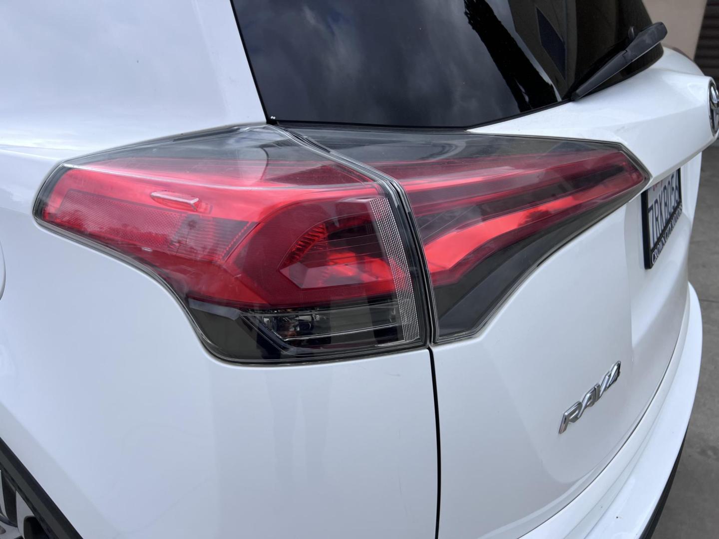 2016 White /Black Toyota RAV4 LE FWD (2T3ZFREV2GW) with an 2.5L L4 DOHC 16V engine, 6A transmission, located at 30 S. Berkeley Avenue, Pasadena, CA, 91107, (626) 248-7567, 34.145447, -118.109398 - 2016 Toyota RAV4 LE FWD – Reliable Compact SUV at Crown City Motors Are you searching for a dependable, stylish, and affordable compact SUV? Look no further than the 2016 Toyota RAV4 LE FWD, available now at Crown City Motors, located at 30 S Berkeley Ave, Pasadena, CA 91107. This popular crossov - Photo#14