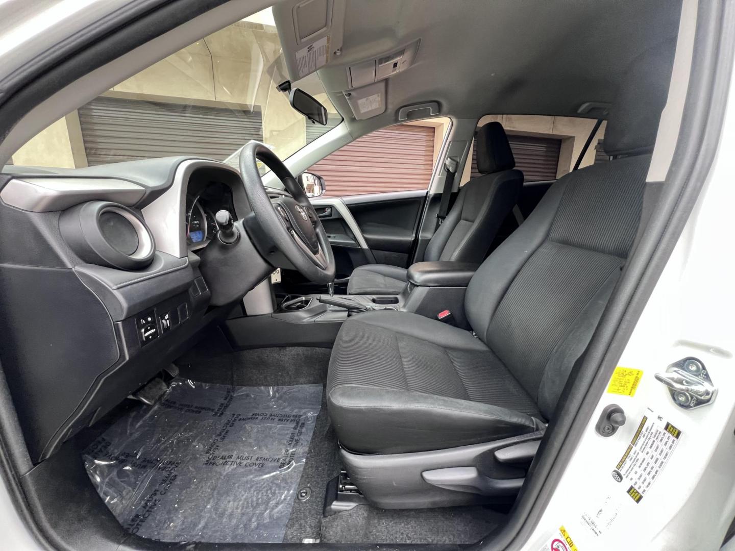 2016 White /Black Toyota RAV4 LE FWD (2T3ZFREV2GW) with an 2.5L L4 DOHC 16V engine, 6A transmission, located at 30 S. Berkeley Avenue, Pasadena, CA, 91107, (626) 248-7567, 34.145447, -118.109398 - 2016 Toyota RAV4 LE FWD – Reliable Compact SUV at Crown City Motors Are you searching for a dependable, stylish, and affordable compact SUV? Look no further than the 2016 Toyota RAV4 LE FWD, available now at Crown City Motors, located at 30 S Berkeley Ave, Pasadena, CA 91107. This popular crossov - Photo#17