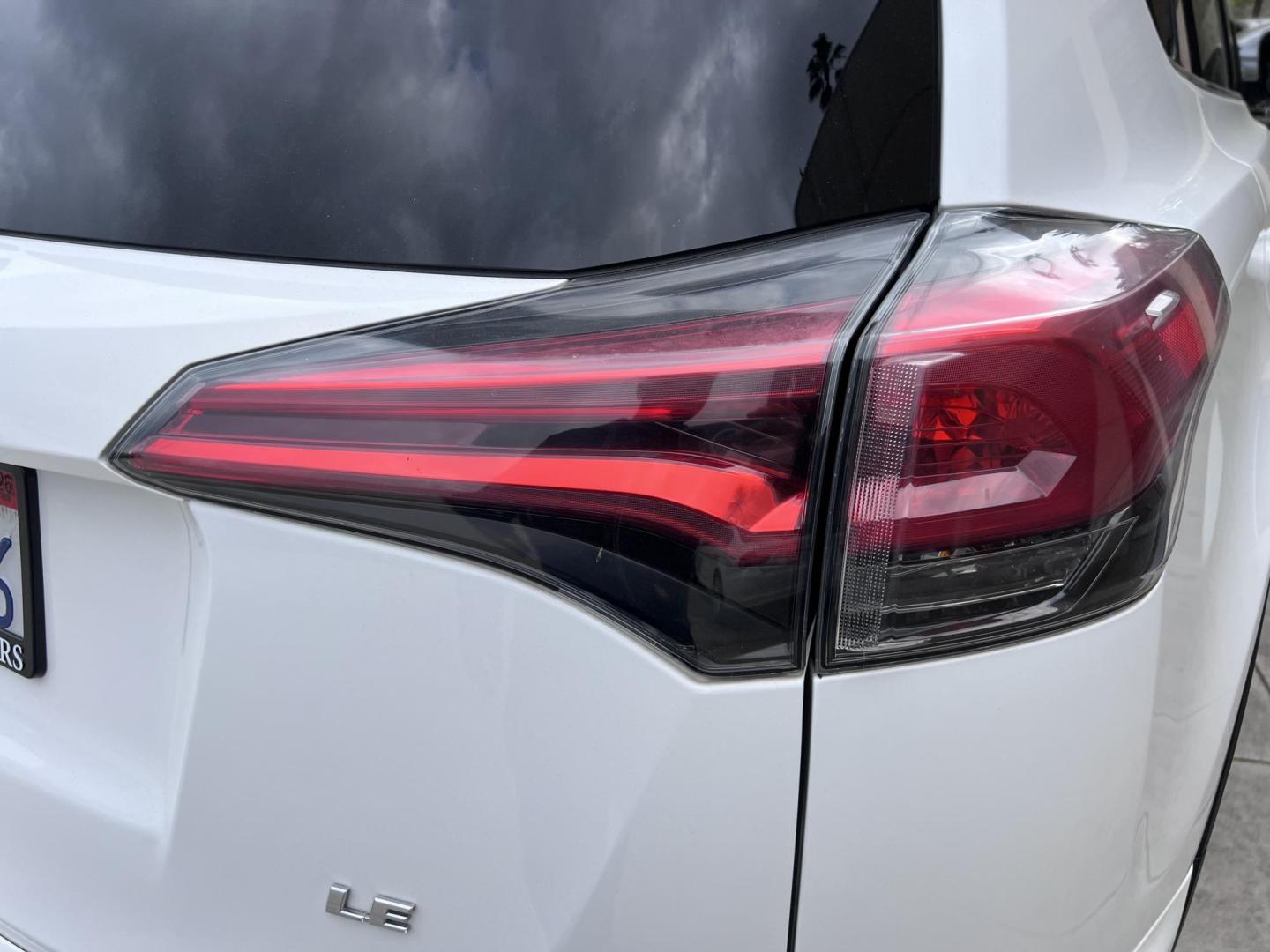 2016 White /Black Toyota RAV4 LE FWD (2T3ZFREV2GW) with an 2.5L L4 DOHC 16V engine, 6A transmission, located at 30 S. Berkeley Avenue, Pasadena, CA, 91107, (626) 248-7567, 34.145447, -118.109398 - 2016 Toyota RAV4 LE FWD – Reliable Compact SUV at Crown City Motors Are you searching for a dependable, stylish, and affordable compact SUV? Look no further than the 2016 Toyota RAV4 LE FWD, available now at Crown City Motors, located at 30 S Berkeley Ave, Pasadena, CA 91107. This popular crossov - Photo#19