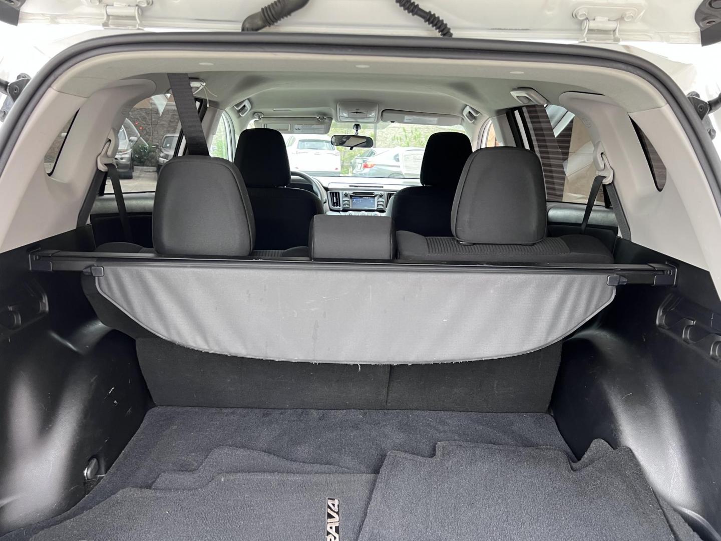 2016 White /Black Toyota RAV4 LE FWD (2T3ZFREV2GW) with an 2.5L L4 DOHC 16V engine, 6A transmission, located at 30 S. Berkeley Avenue, Pasadena, CA, 91107, (626) 248-7567, 34.145447, -118.109398 - 2016 Toyota RAV4 LE FWD – Reliable Compact SUV at Crown City Motors Are you searching for a dependable, stylish, and affordable compact SUV? Look no further than the 2016 Toyota RAV4 LE FWD, available now at Crown City Motors, located at 30 S Berkeley Ave, Pasadena, CA 91107. This popular crossov - Photo#27