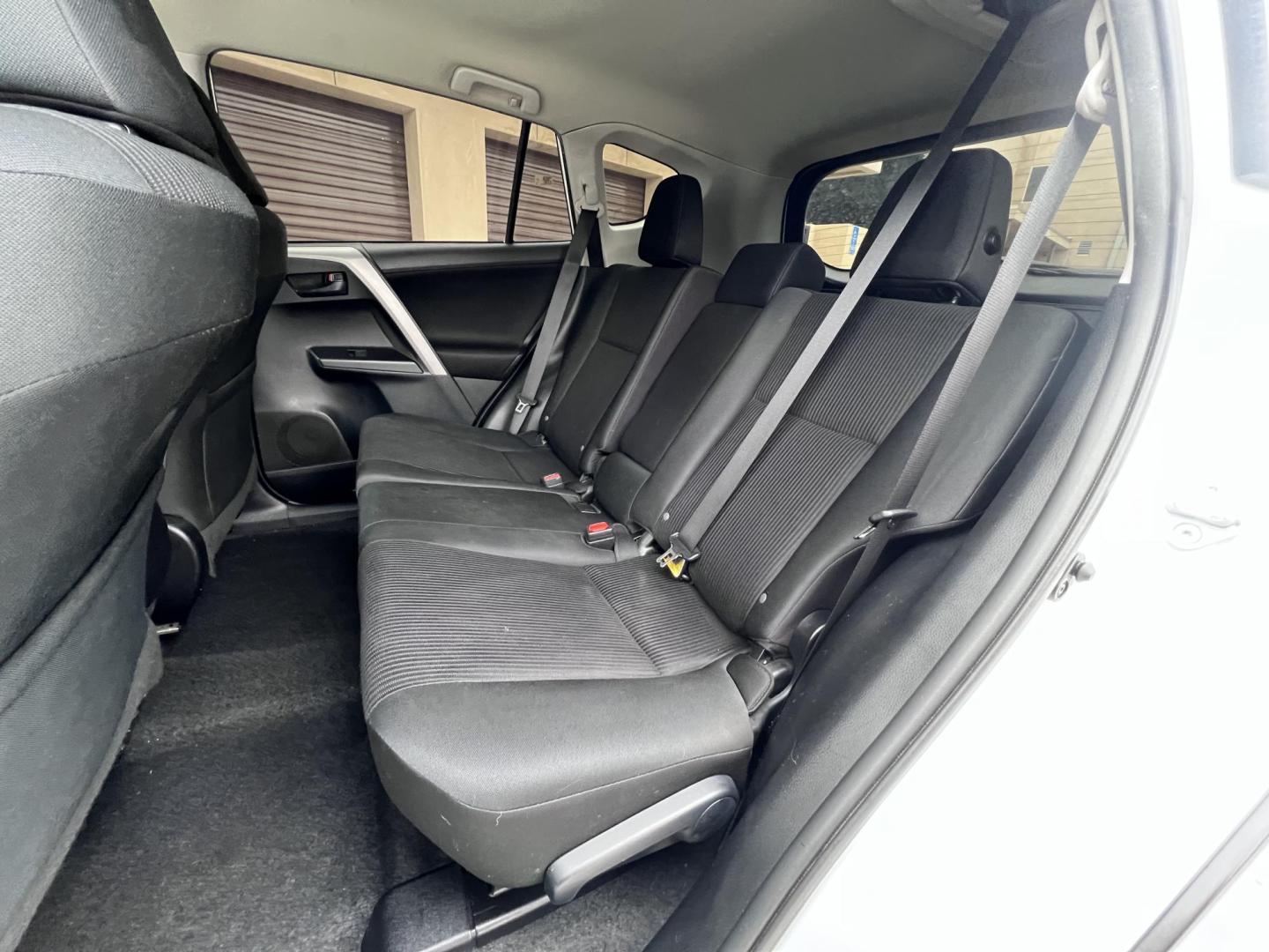 2016 White /Black Toyota RAV4 LE FWD (2T3ZFREV2GW) with an 2.5L L4 DOHC 16V engine, 6A transmission, located at 30 S. Berkeley Avenue, Pasadena, CA, 91107, (626) 248-7567, 34.145447, -118.109398 - 2016 Toyota RAV4 LE FWD – Reliable Compact SUV at Crown City Motors Are you searching for a dependable, stylish, and affordable compact SUV? Look no further than the 2016 Toyota RAV4 LE FWD, available now at Crown City Motors, located at 30 S Berkeley Ave, Pasadena, CA 91107. This popular crossov - Photo#29
