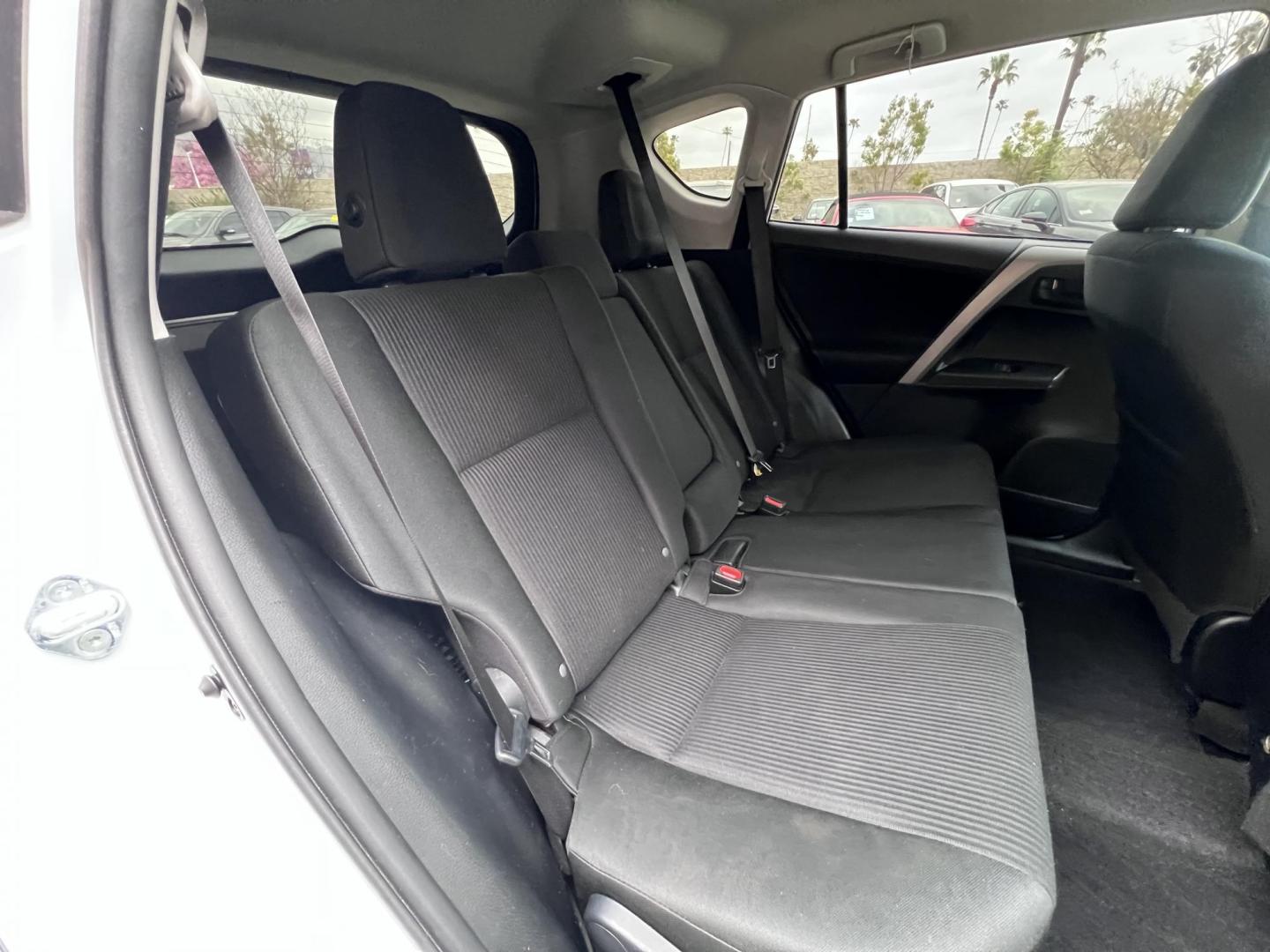2016 White /Black Toyota RAV4 LE FWD (2T3ZFREV2GW) with an 2.5L L4 DOHC 16V engine, 6A transmission, located at 30 S. Berkeley Avenue, Pasadena, CA, 91107, (626) 248-7567, 34.145447, -118.109398 - 2016 Toyota RAV4 LE FWD – Reliable Compact SUV at Crown City Motors Are you searching for a dependable, stylish, and affordable compact SUV? Look no further than the 2016 Toyota RAV4 LE FWD, available now at Crown City Motors, located at 30 S Berkeley Ave, Pasadena, CA 91107. This popular crossov - Photo#32