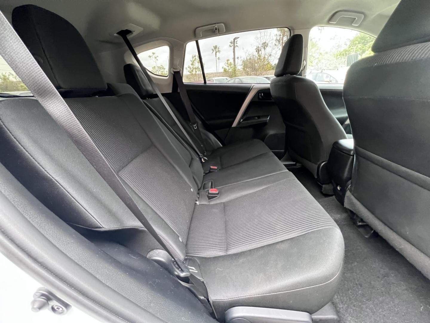 2016 White /Black Toyota RAV4 LE FWD (2T3ZFREV2GW) with an 2.5L L4 DOHC 16V engine, 6A transmission, located at 30 S. Berkeley Avenue, Pasadena, CA, 91107, (626) 248-7567, 34.145447, -118.109398 - 2016 Toyota RAV4 LE FWD – Reliable Compact SUV at Crown City Motors Are you searching for a dependable, stylish, and affordable compact SUV? Look no further than the 2016 Toyota RAV4 LE FWD, available now at Crown City Motors, located at 30 S Berkeley Ave, Pasadena, CA 91107. This popular crossov - Photo#33