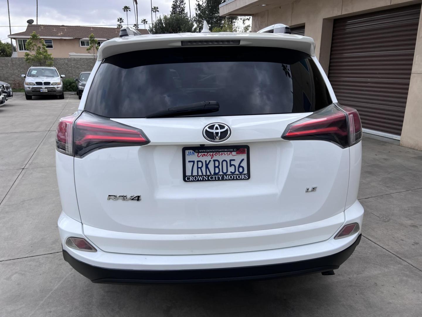 2016 White /Black Toyota RAV4 LE FWD (2T3ZFREV2GW) with an 2.5L L4 DOHC 16V engine, 6A transmission, located at 30 S. Berkeley Avenue, Pasadena, CA, 91107, (626) 248-7567, 34.145447, -118.109398 - 2016 Toyota RAV4 LE FWD – Reliable Compact SUV at Crown City Motors Are you searching for a dependable, stylish, and affordable compact SUV? Look no further than the 2016 Toyota RAV4 LE FWD, available now at Crown City Motors, located at 30 S Berkeley Ave, Pasadena, CA 91107. This popular crossov - Photo#5