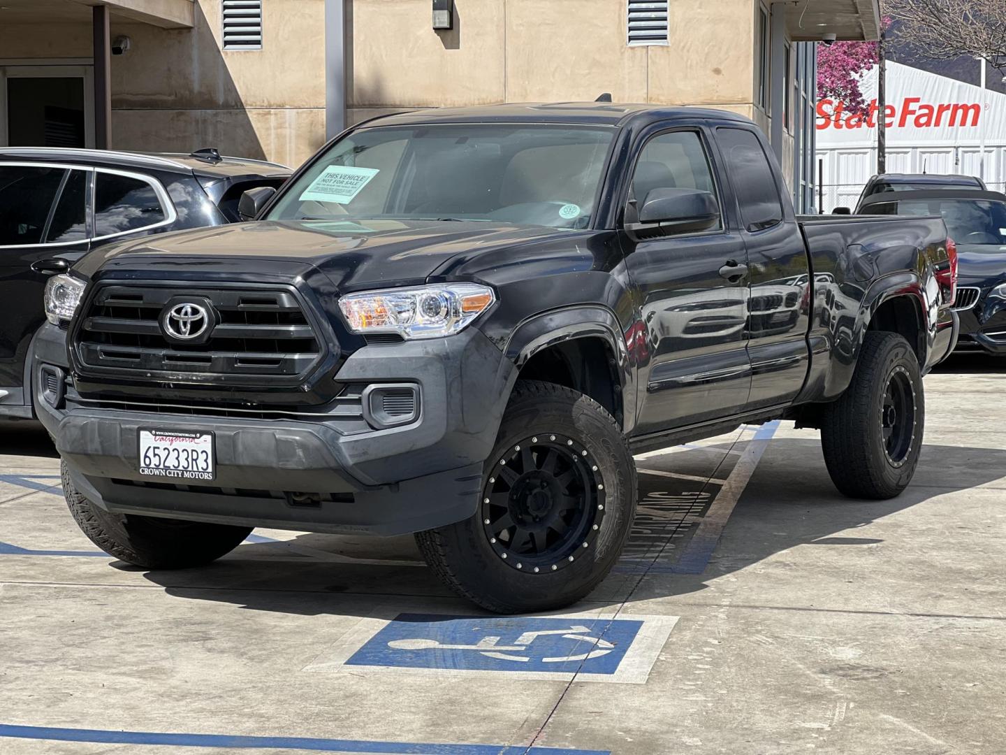 2016 BLACK /gray Toyota Tacoma SR5 Access Cab I4 6AT 2WD (5TFRX5GN4GX) with an 2.7L L4 DOHC 16V engine, 5A transmission, located at 30 S. Berkeley Avenue, Pasadena, CA, 91107, (626) 248-7567, 34.145447, -118.109398 - Crown City Motors is a used “Buy Here Pay Here” car dealer in Pasadena CA. “Buy Here Pay Here” financing, means that when you purchase your vehicle from our dealership, that you make the payments to the dealership as well. We do not need the banks approval to get you approved for a used auto - Photo#0