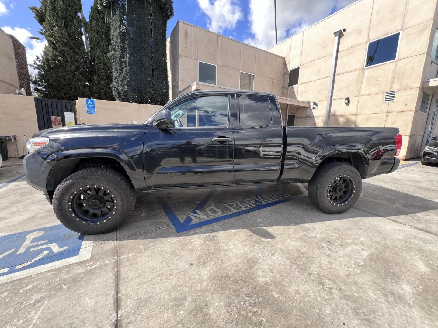 2016 BLACK /gray Toyota Tacoma SR5 Access Cab I4 6AT 2WD (5TFRX5GN4GX) with an 2.7L L4 DOHC 16V engine, 5A transmission, located at 30 S. Berkeley Avenue, Pasadena, CA, 91107, (626) 248-7567, 34.145447, -118.109398 - Crown City Motors is a used “Buy Here Pay Here” car dealer in Pasadena CA. “Buy Here Pay Here” financing, means that when you purchase your vehicle from our dealership, that you make the payments to the dealership as well. We do not need the banks approval to get you approved for a used auto - Photo#1
