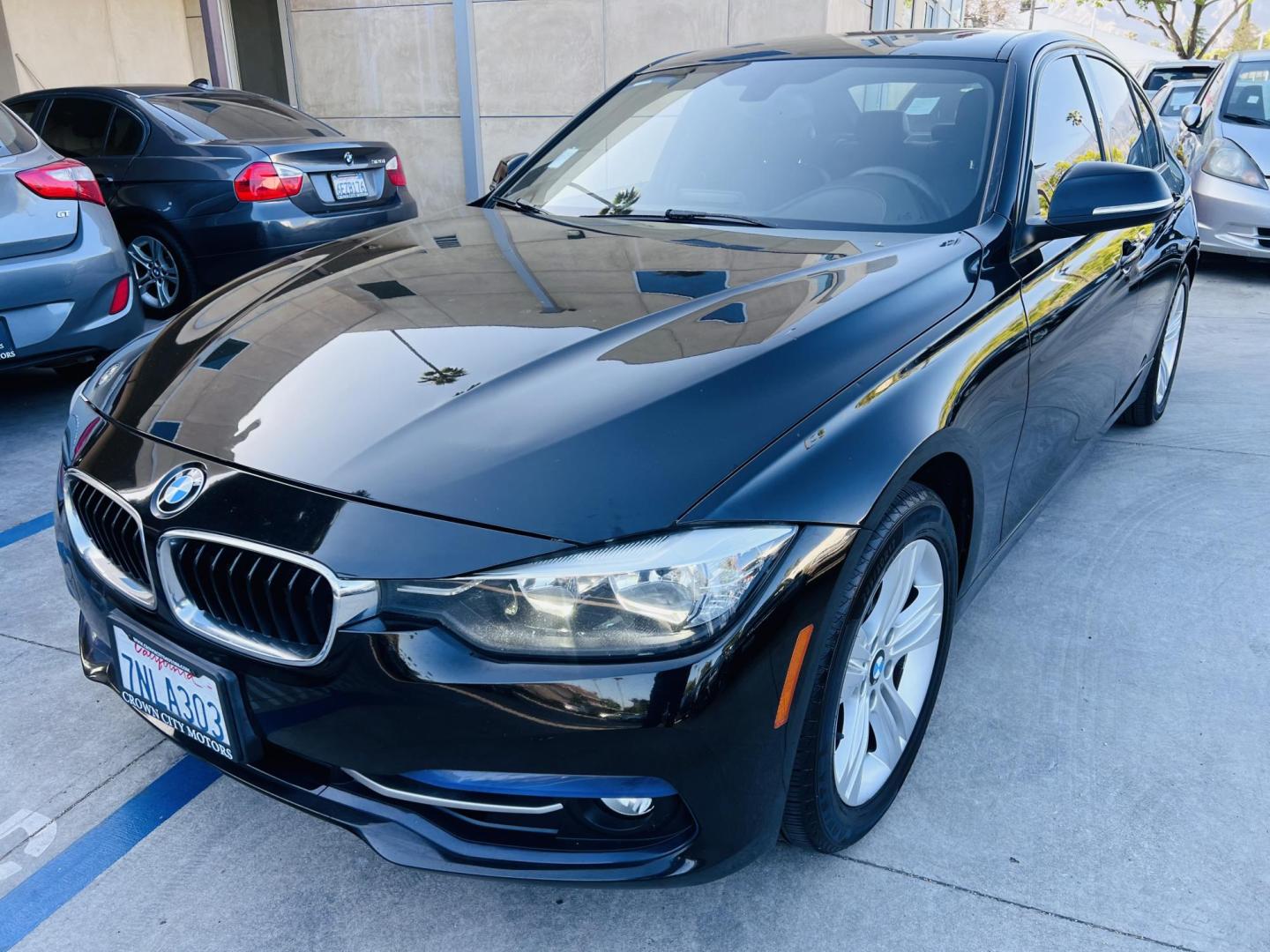 2016 BLACK /Black BMW 3-Series 328i Sedan (WBA8E9C52GK) with an 2.0L L4 DOHC 16V engine, 8A transmission, located at 30 S. Berkeley Avenue, Pasadena, CA, 91107, (626) 248-7567, 34.145447, -118.109398 - 016 BMW 328i – Sporty, Luxurious, and Affordable – Available Now at Crown City Motors in Pasadena, CA If you’re searching for a stylish, reliable, and performance-driven sedan that turns heads and makes every drive enjoyable, look no further than this 2016 BMW 328i – now available at Crow - Photo#8