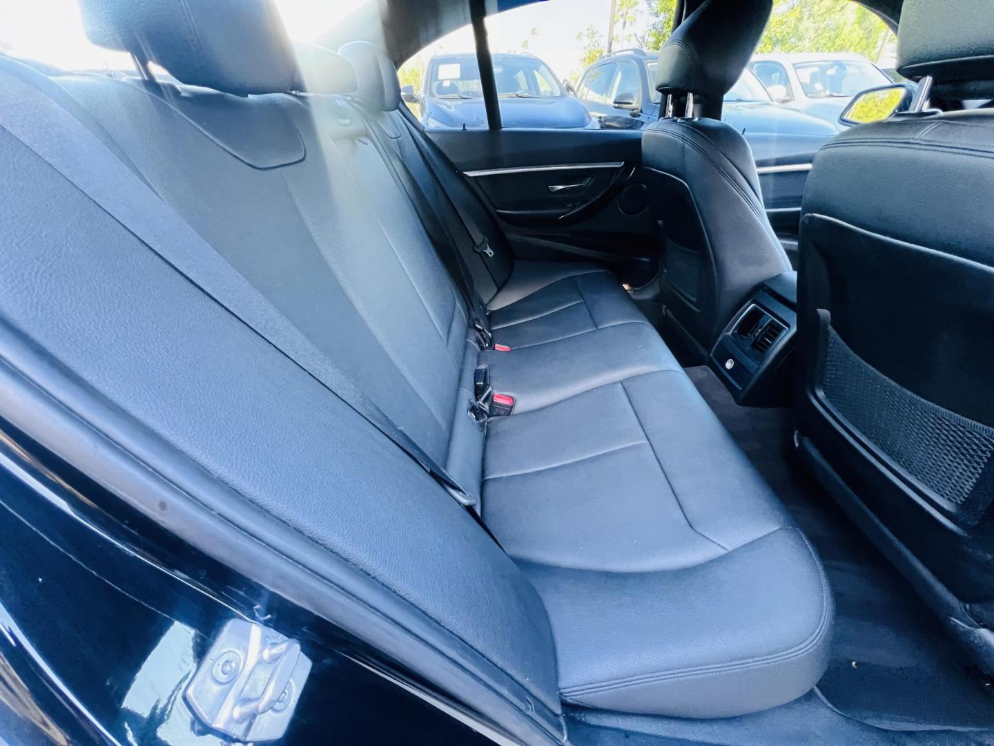 2016 BLACK /Black BMW 3-Series 328i Sedan (WBA8E9C52GK) with an 2.0L L4 DOHC 16V engine, 8A transmission, located at 30 S. Berkeley Avenue, Pasadena, CA, 91107, (626) 248-7567, 34.145447, -118.109398 - 016 BMW 328i – Sporty, Luxurious, and Affordable – Available Now at Crown City Motors in Pasadena, CA If you’re searching for a stylish, reliable, and performance-driven sedan that turns heads and makes every drive enjoyable, look no further than this 2016 BMW 328i – now available at Crow - Photo#16