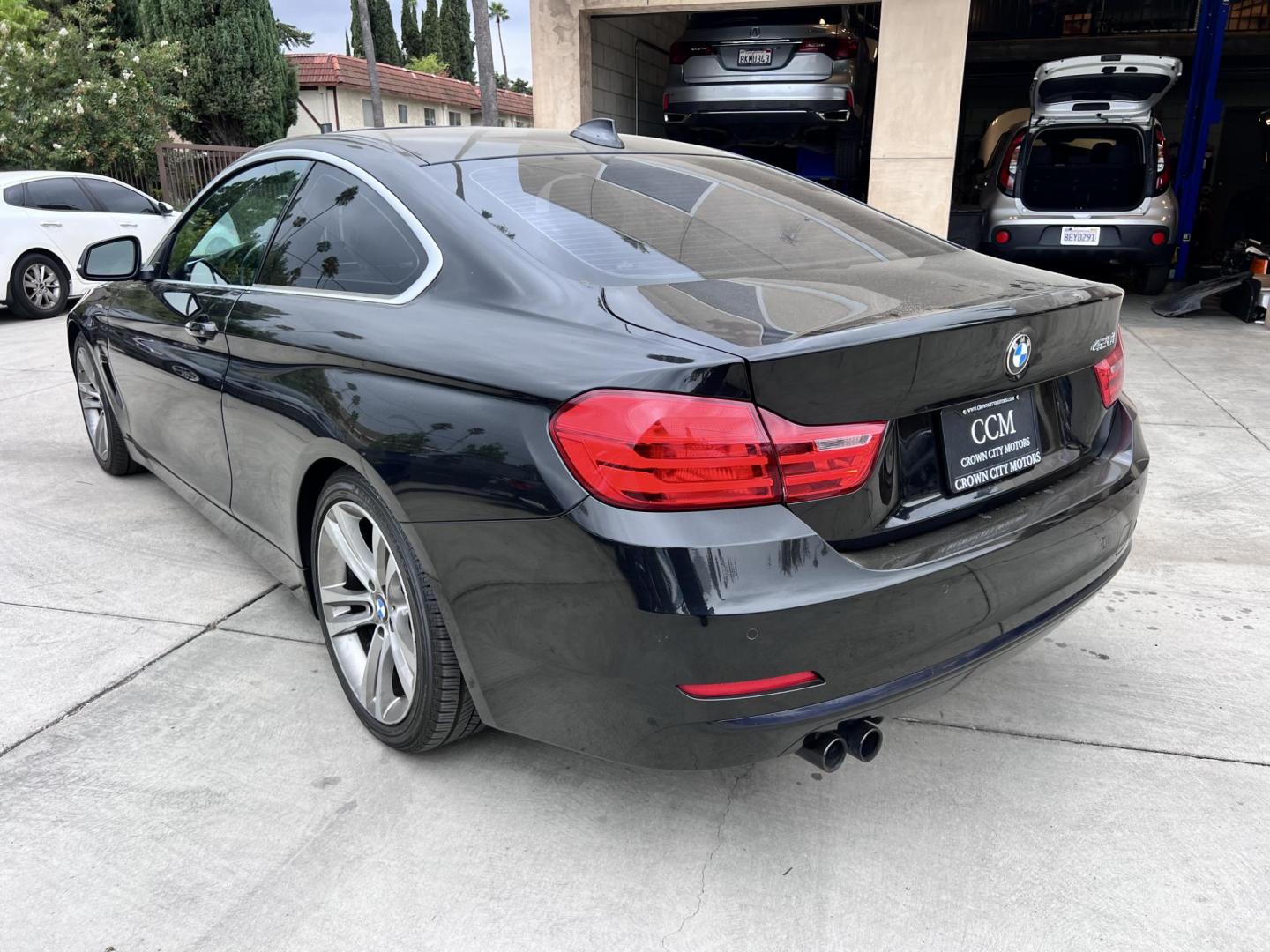 2016 Black BMW 4-Series 428i SULEV Coupe (WBA3N7C57GK) with an 2.0L L4 DOHC 16V engine, 8A transmission, located at 30 S. Berkeley Avenue, Pasadena, CA, 91107, (626) 248-7567, 34.145447, -118.109398 - At Crown City Motors, we understand that life can throw financial challenges your way. That’s why we proudly offer Buy Here Pay Here (BHPH) financing to help drivers in Pasadena and the greater Los Angeles area get into the vehicles they need — even when traditional lenders say no. One of the st - Photo#3