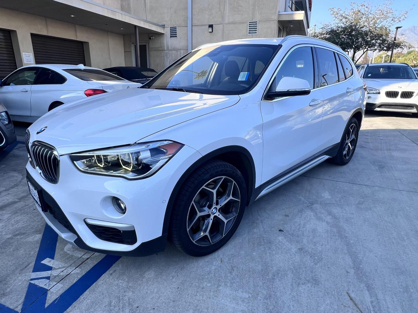 2016 White /Black BMW X1 xDrive28i (WBXHT3C38GP) with an 2.0L L4 DOHC 16V engine, 8A transmission, located at 30 S. Berkeley Avenue, Pasadena, CA, 91107, (626) 248-7567, 34.145447, -118.109398 - 2016 BMW X1 xDrive28i – White / Black Interior – Buy Here Pay Here Pasadena Luxury, performance, and practicality come together in this 2016 BMW X1 xDrive28i (VIN WBXHT3C38GP885411) featuring a white exterior over a black interior. This compact luxury SUV offers premium comfort, spirited perf - Photo#0