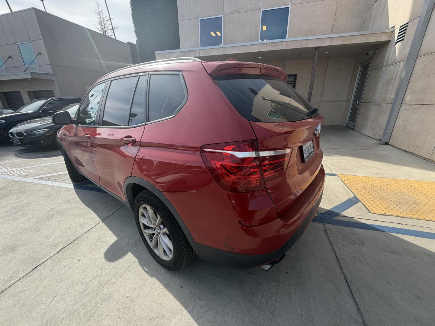 2016 RED /Tan BMW X3 xDrive28i (5UXWX9C50G0) with an 2.0L L4 DOHC 16V engine, 8-Speed Automatic transmission, located at 30 S. Berkeley Avenue, Pasadena, CA, 91107, (626) 248-7567, 34.145447, -118.109398 - Crown City Motors is a used “Buy Here Pay Here” car dealer in Pasadena CA. “Buy Here Pay Here” financing, means that when you purchase your vehicle from our dealership, that you make the payments to the dealership as well. We do not need the banks approval to get you approved for a used auto - Photo#2