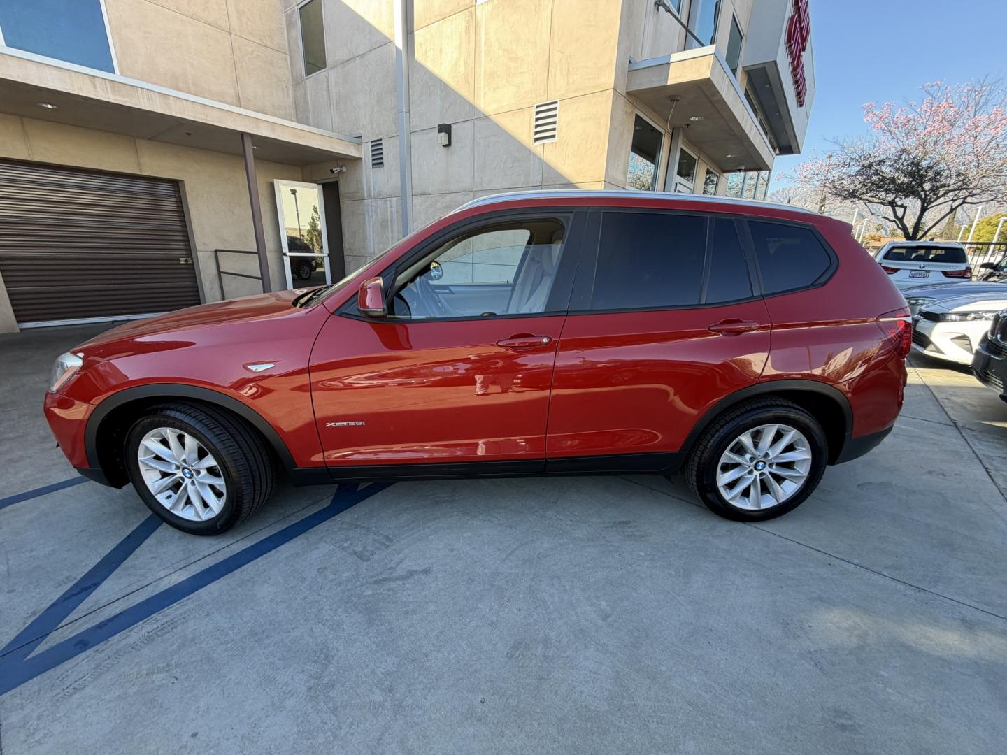2016 RED /Tan BMW X3 xDrive28i (5UXWX9C50G0) with an 2.0L L4 DOHC 16V engine, 8-Speed Automatic transmission, located at 30 S. Berkeley Avenue, Pasadena, CA, 91107, (626) 248-7567, 34.145447, -118.109398 - Crown City Motors is a used “Buy Here Pay Here” car dealer in Pasadena CA. “Buy Here Pay Here” financing, means that when you purchase your vehicle from our dealership, that you make the payments to the dealership as well. We do not need the banks approval to get you approved for a used auto - Photo#8