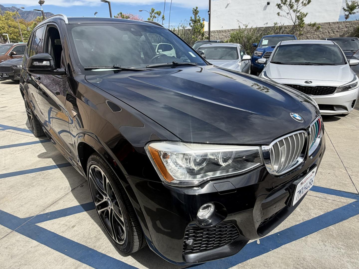 2016 Black /black BMW X3 xDrive28i (5UXWX9C53G0) with an 2.0L L4 DOHC 16V engine, 8-Speed Automatic transmission, located at 30 S. Berkeley Avenue, Pasadena, CA, 91107, (626) 248-7567, 34.145447, -118.109398 - Crown City Motors is a used “Buy Here Pay Here” car dealer in Pasadena CA. “Buy Here Pay Here” financing, means that when you purchase your vehicle from our dealership, that you make the payments to the dealership as well. We do not need the banks approval to get you approved for a used auto - Photo#11