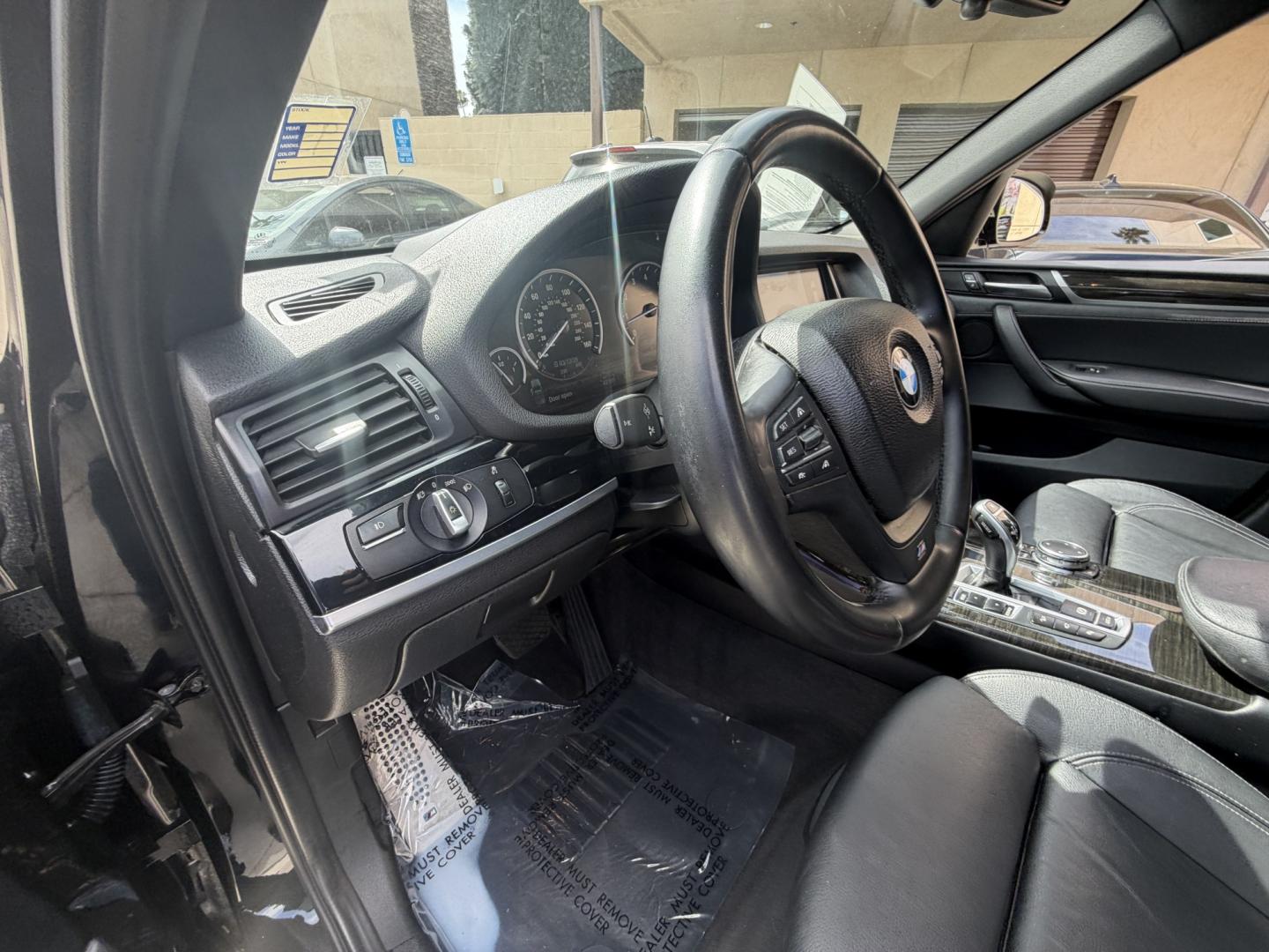 2016 Black /black BMW X3 xDrive28i (5UXWX9C53G0) with an 2.0L L4 DOHC 16V engine, 8-Speed Automatic transmission, located at 30 S. Berkeley Avenue, Pasadena, CA, 91107, (626) 248-7567, 34.145447, -118.109398 - Crown City Motors is a used “Buy Here Pay Here” car dealer in Pasadena CA. “Buy Here Pay Here” financing, means that when you purchase your vehicle from our dealership, that you make the payments to the dealership as well. We do not need the banks approval to get you approved for a used auto - Photo#24